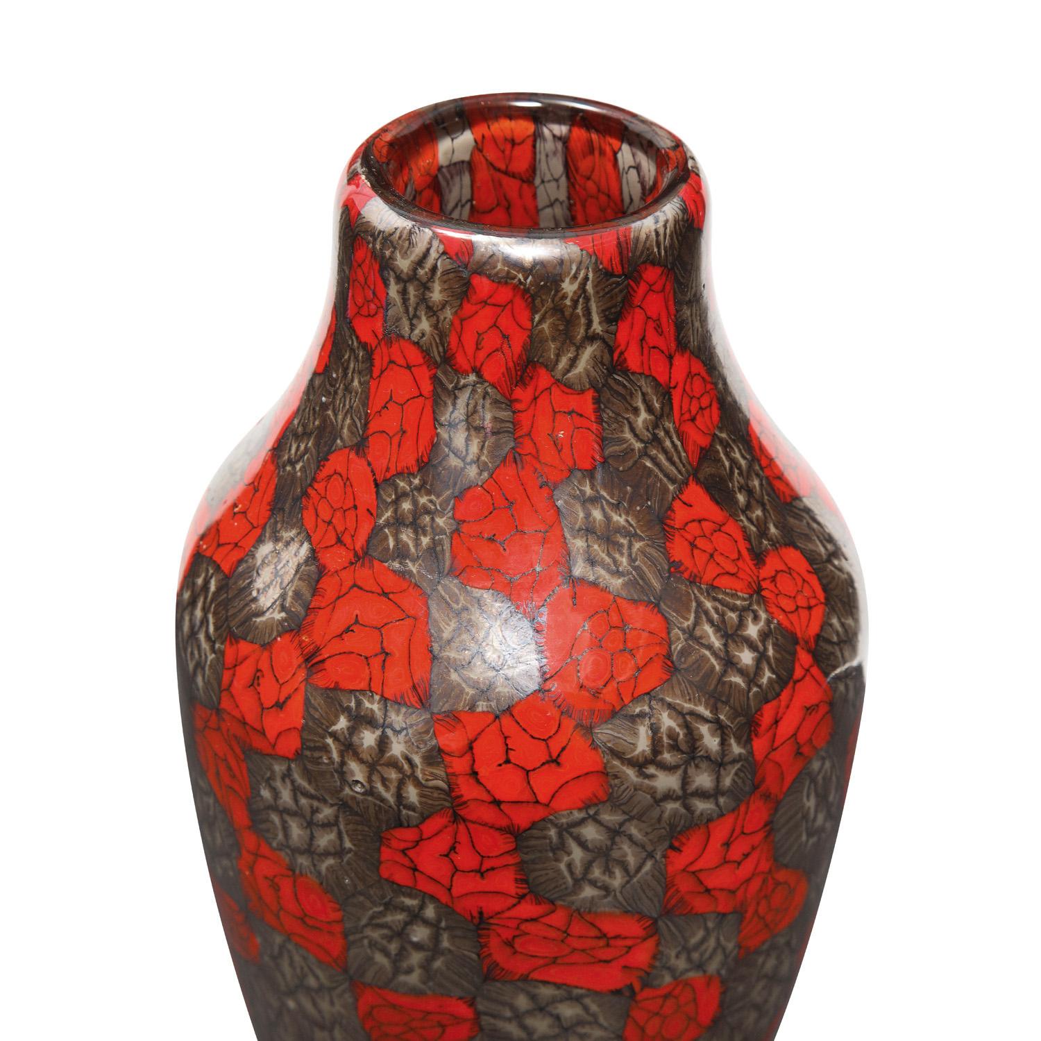 Hand-blown glass vase with unique red, metallic gray and black murrine by Vittorio Ferro, Murano Italy, 1990’s. Born in 1932, Vittorio Ferro was a first rate glass master who spent many years working at Fratelli Toso in the 1950’s and 60’s, blowing