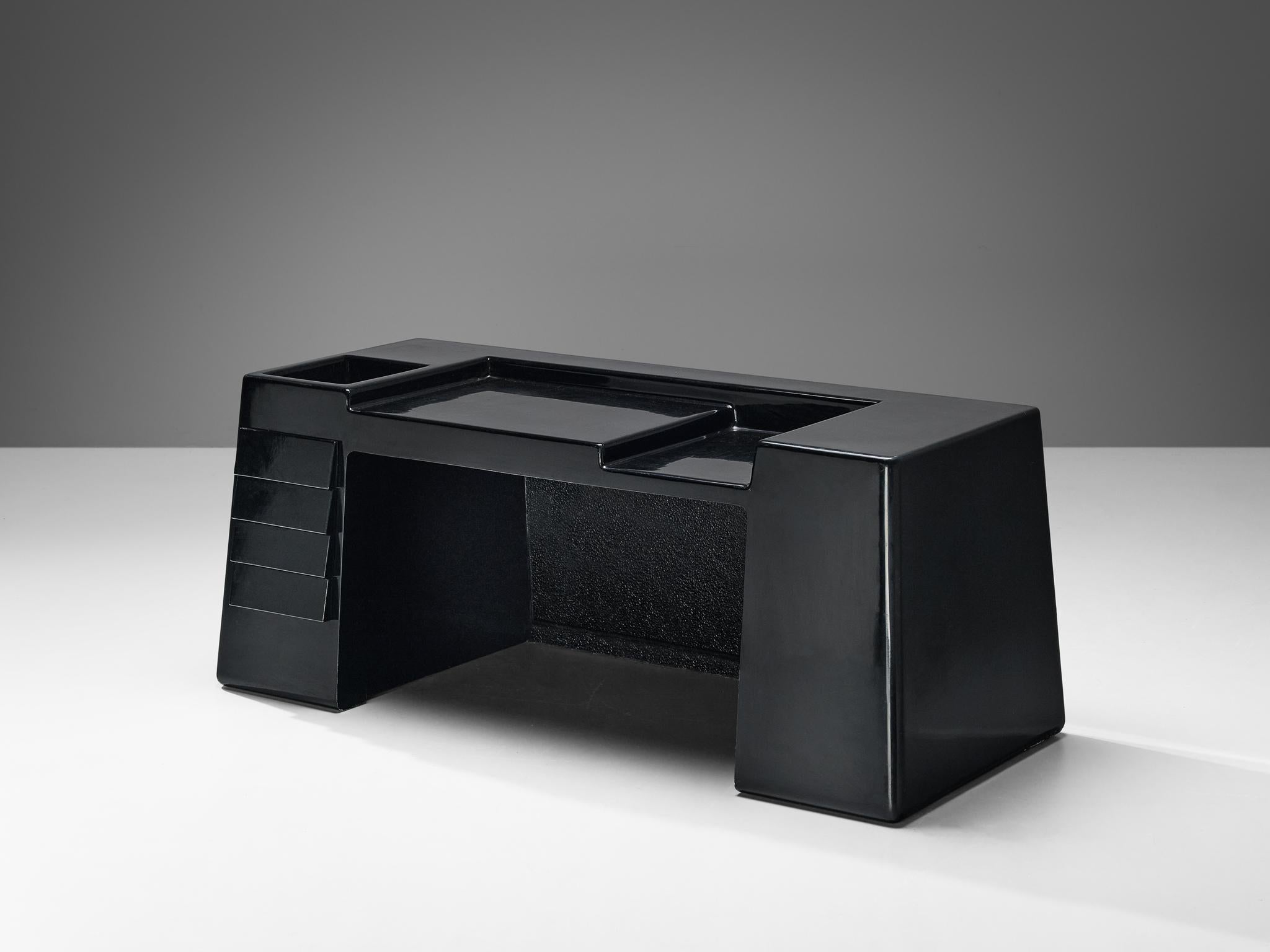 Vittorio Introini for Saporiti, free-standing desk, fiberglass, Italy, 1969

This admirable free-standing desk was designed by the Italian designer Vittorio Introini. Due to its all-black design and the distinct shapes, this desk has a strong