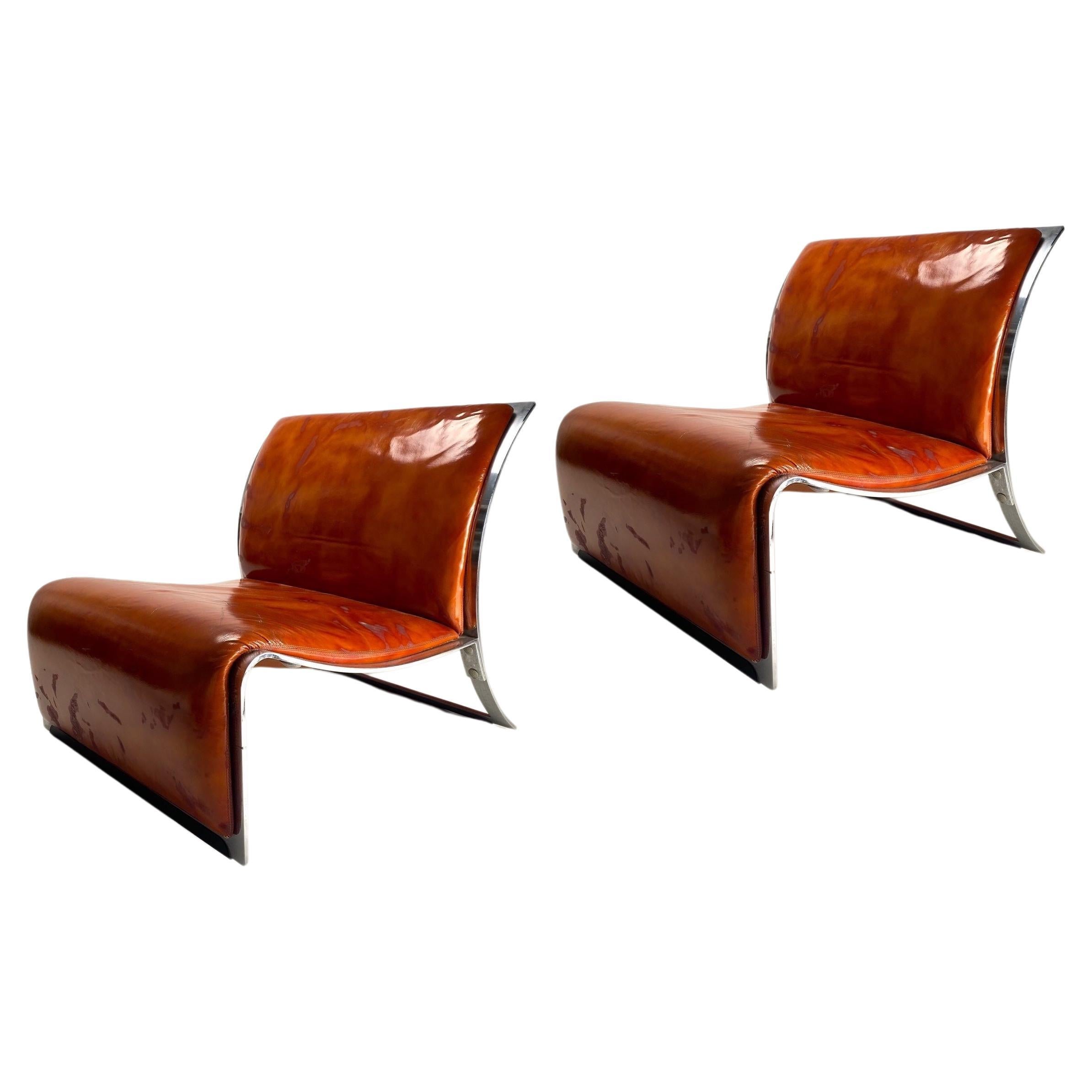 Vittorio Introini  Pair of chromed metal and leather armchairs for Saporiti