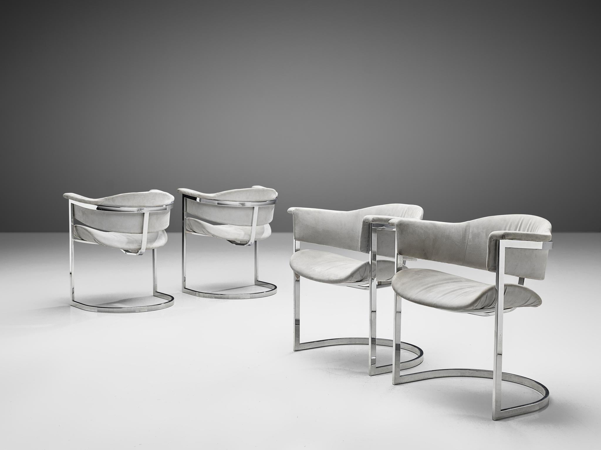 Vittorio Introini for Mario Sabot, set of four dining chairs, chrome-plated steel, fabric, Italy, 1970s.

A stunning set of four cantilevered dining chairs, designed by the acclaimed Vittorio Introini in the 1970s. These chairs feature a sleek,