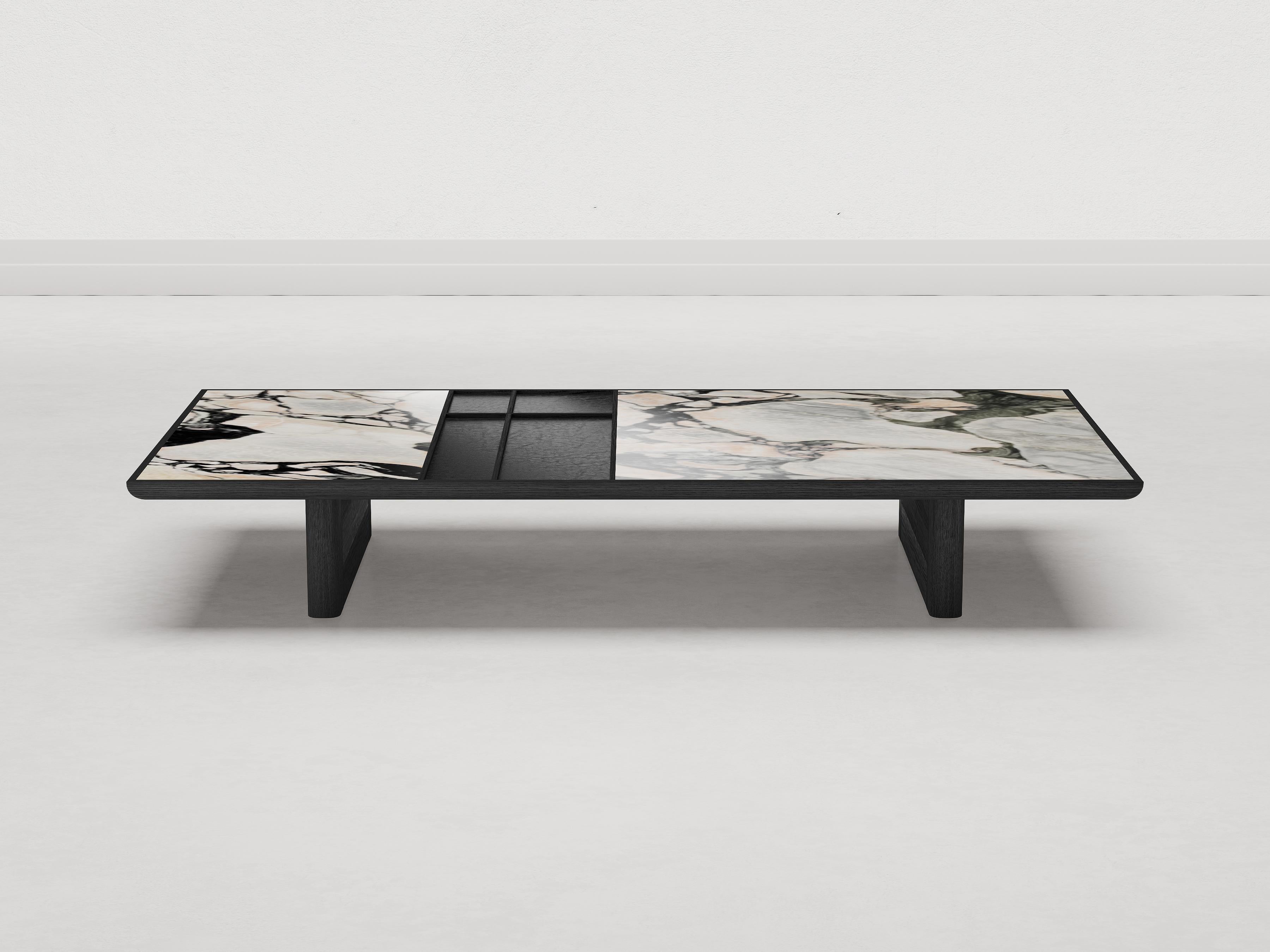 The Vittorio series of side tables is striking in its simplicity and elegance. The bold, archetypal structure emphasizes the beauty and naturalness of wood.
A customizable leather top supported by two plinths with curved ends and joined by a subtle