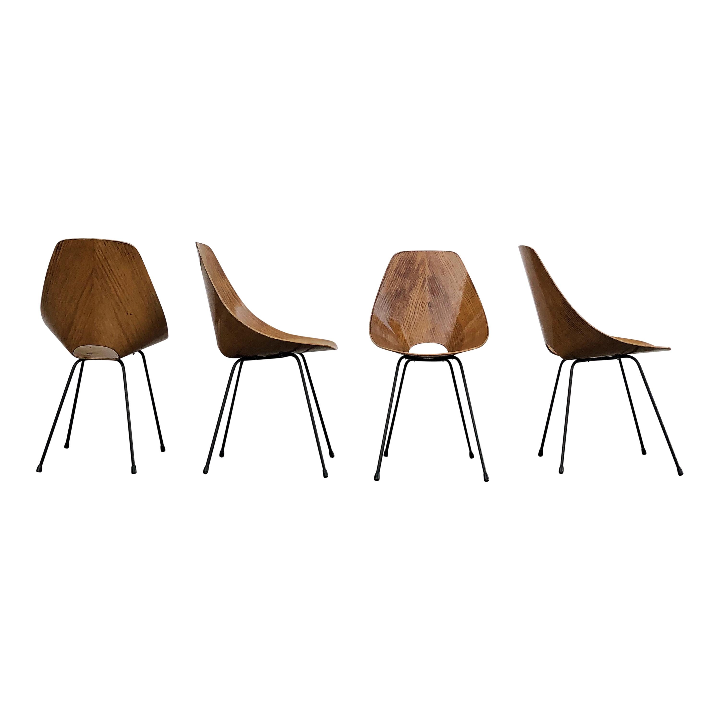 Set composed of four Medea dining chairs, designed by Vittorio Nobili for Fratelli Tagliabue in 1954.

Made of ash plywood, excellent vintage condition.

Reported at “Compasso d’Oro Prize at Milano Triennale, in 1956.

The Medea chair was