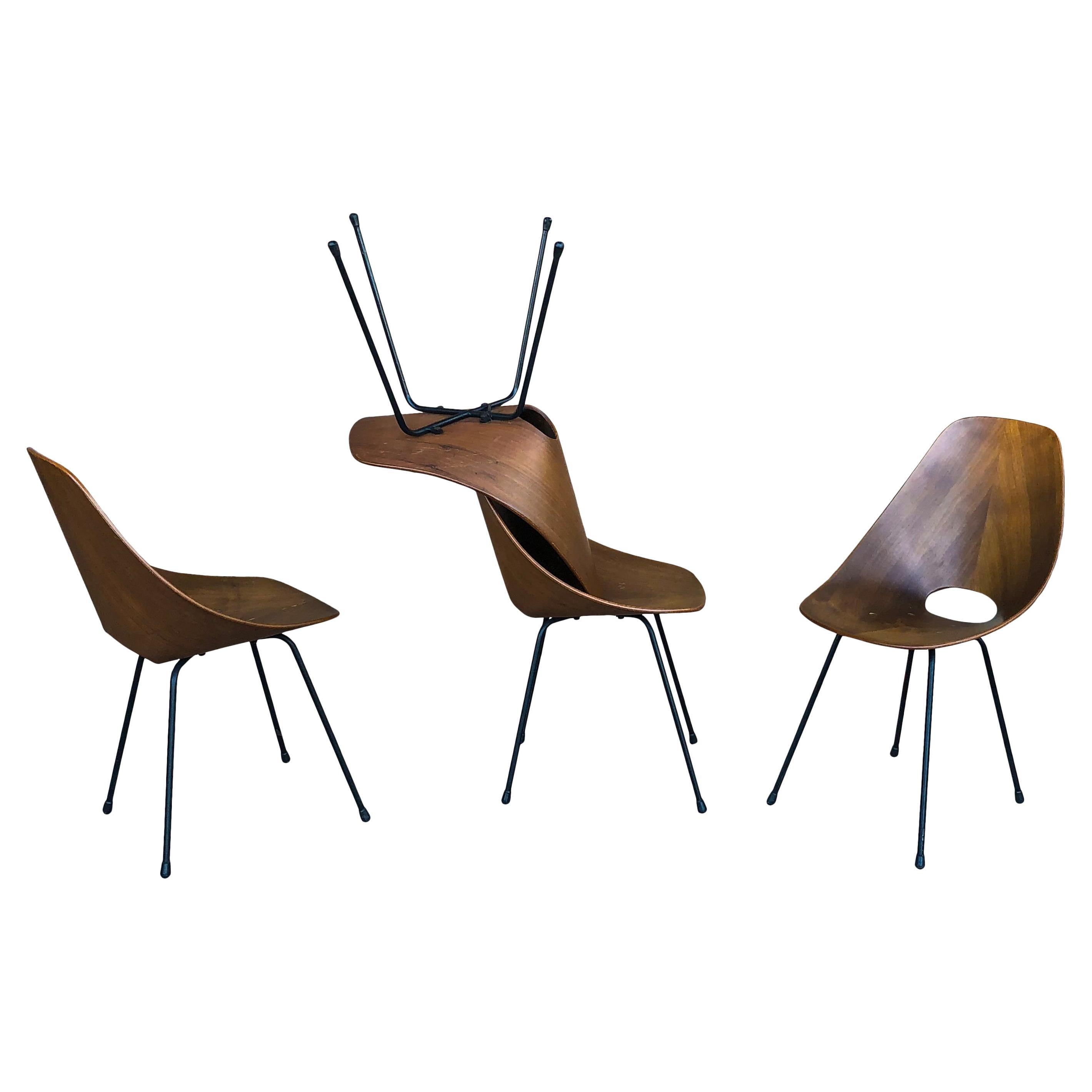 Set composed of four Medea dining chairs, designed by Vittorio Nobili for Fratelli Tagliabue in 1954.

Made of teak plywood, excellent vintage condition.

Reported at “Compasso d’Oro Prize at Milano Triennale, in 1956.

The Medea chair was