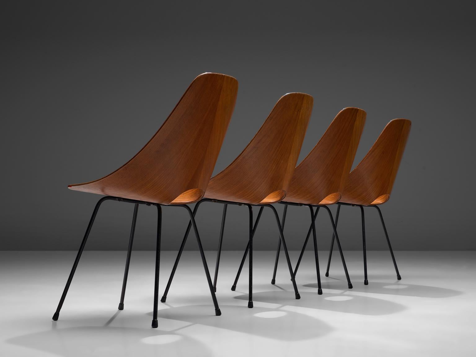 Vittorio Nobili for Tagliabue, set of four dining chairs 'Medea', teak and mahogany, Italy, 1955. 

This 'Medea' chair is designed by the Italian designer Vittorio Nobili. The plywood chairs are veneered in carefully chosen mahogany, which gives