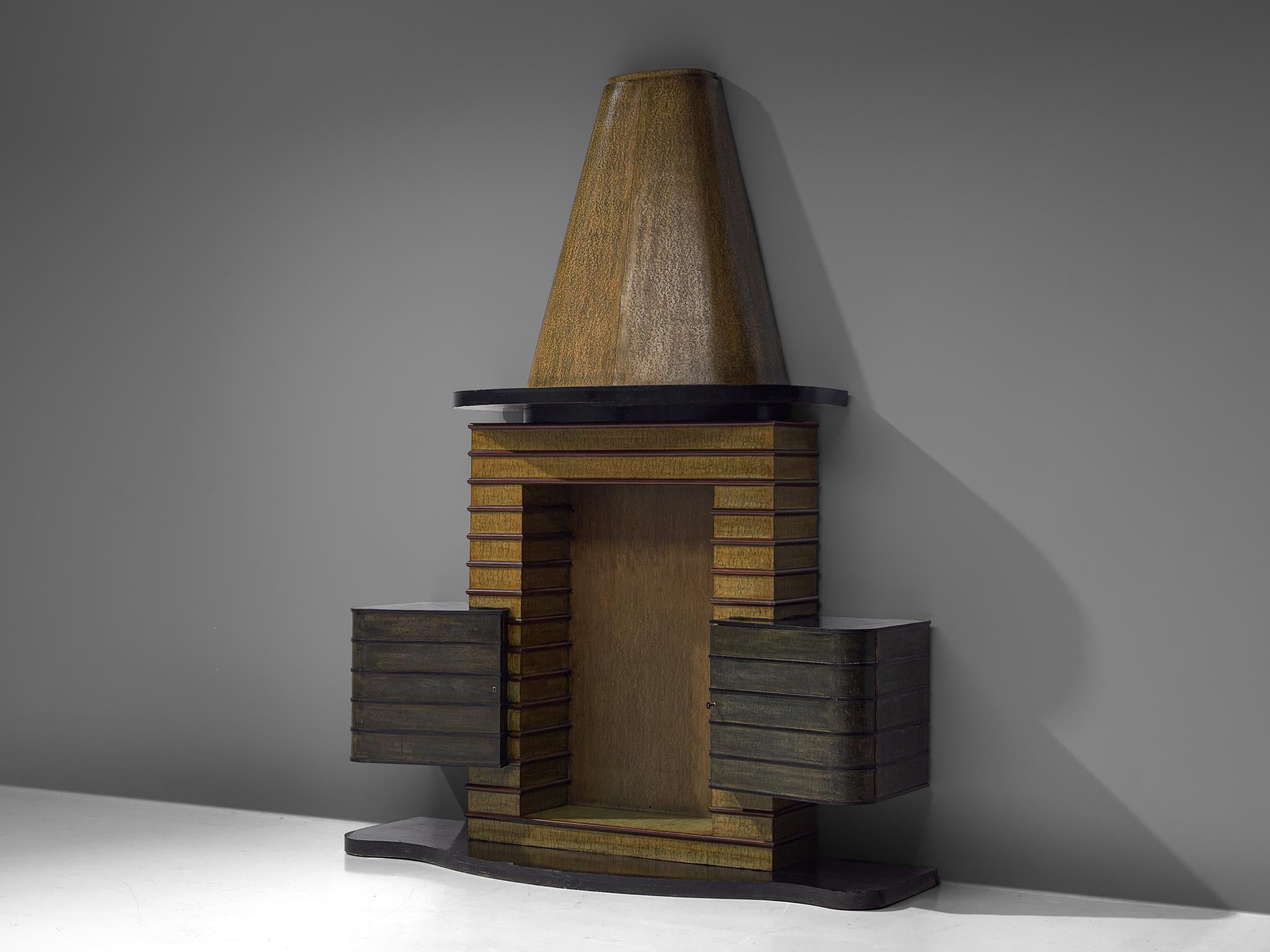 Vittorio Valabrega, bar cabinet, wood, Italy, 1930s

A bar cabinet by the Italian artist and designer Vittorio Valabrega from the 1930s. The cabinet features an organic shaped base in black lacquer. The storage area consists of three elements, one