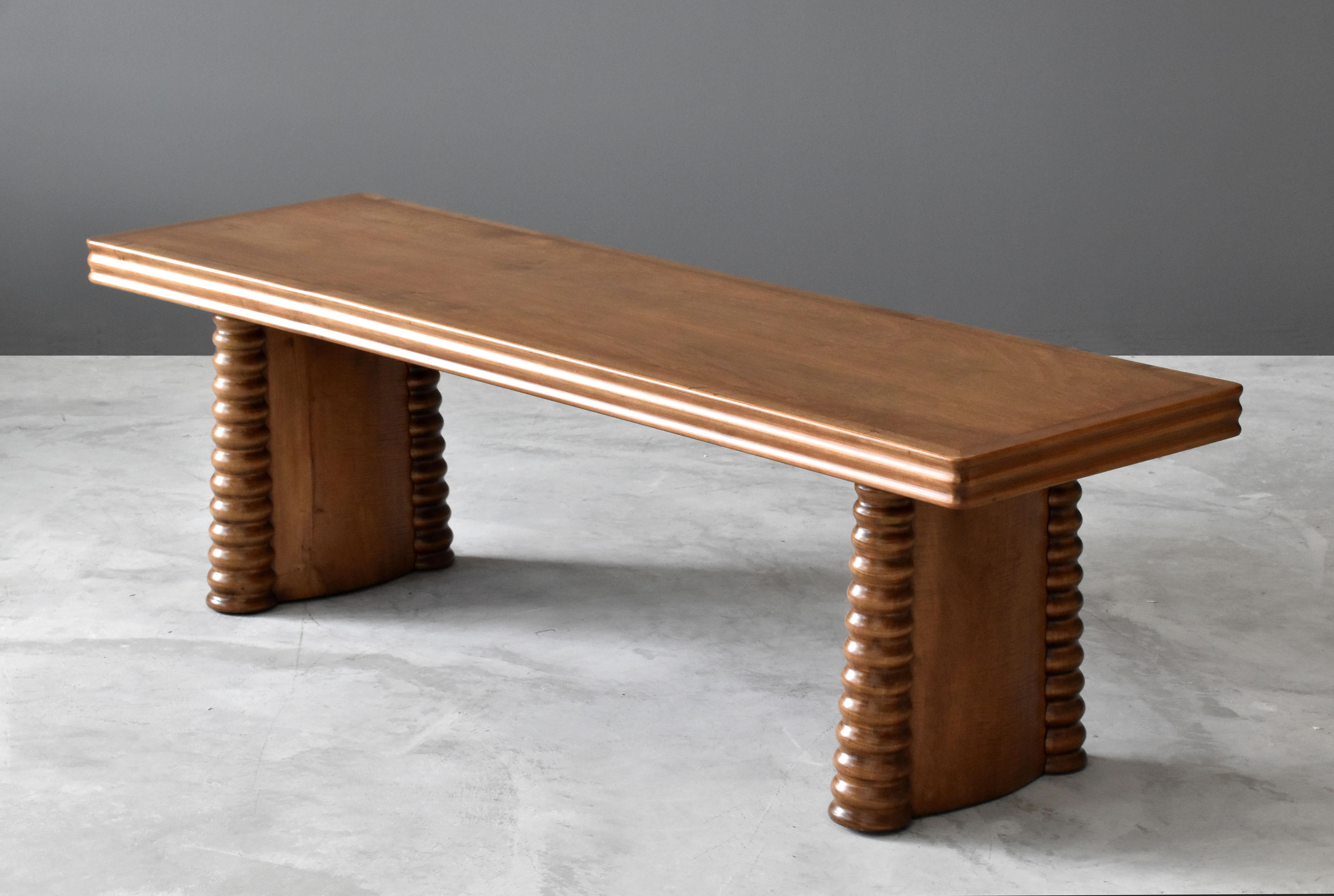 A bench or coffee or cocktail table, designed by Vittorio Valabrega, produced by his firm, Valabrega, in Turin, Italy, circa 1940. 

This simple modernist design is further enhanced by hand carved details.