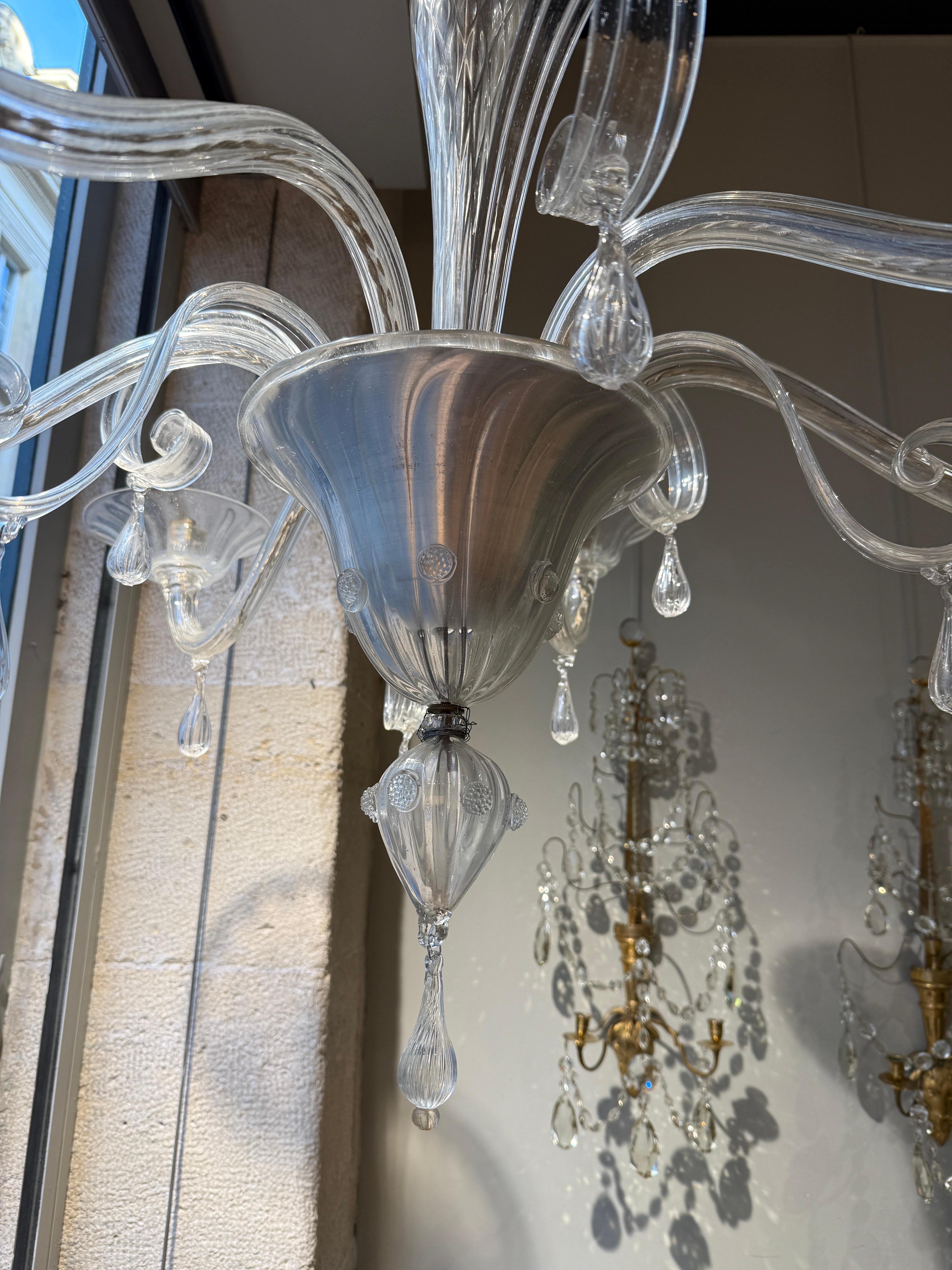 Elegant tall 6 arms chandelier in clear glass attributed to vittorio Zecchin 
Murano Italy circa 1930 