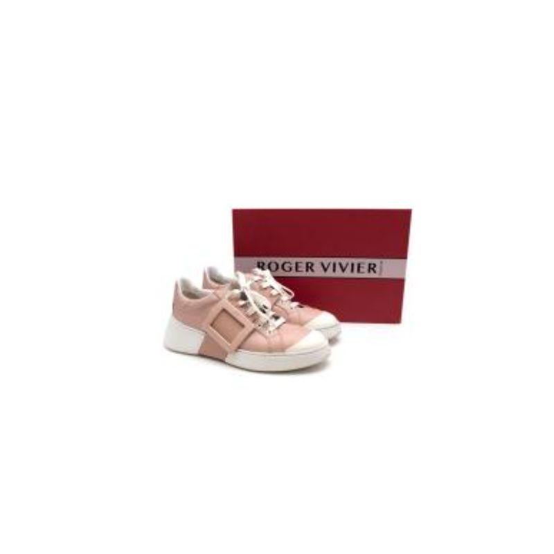 Roger Vivier Viv Skate Exclusive Sneakers
 
 -Front lace-up closure
 -Side rubber strap with metal buckle detail
 -Rubber outsole
 -Brand tag outline at the back end of the shoe 
 -Round toe 
 
 Material:
 
 Leather 
 Rubber 
 
 Made in Italy 
 
