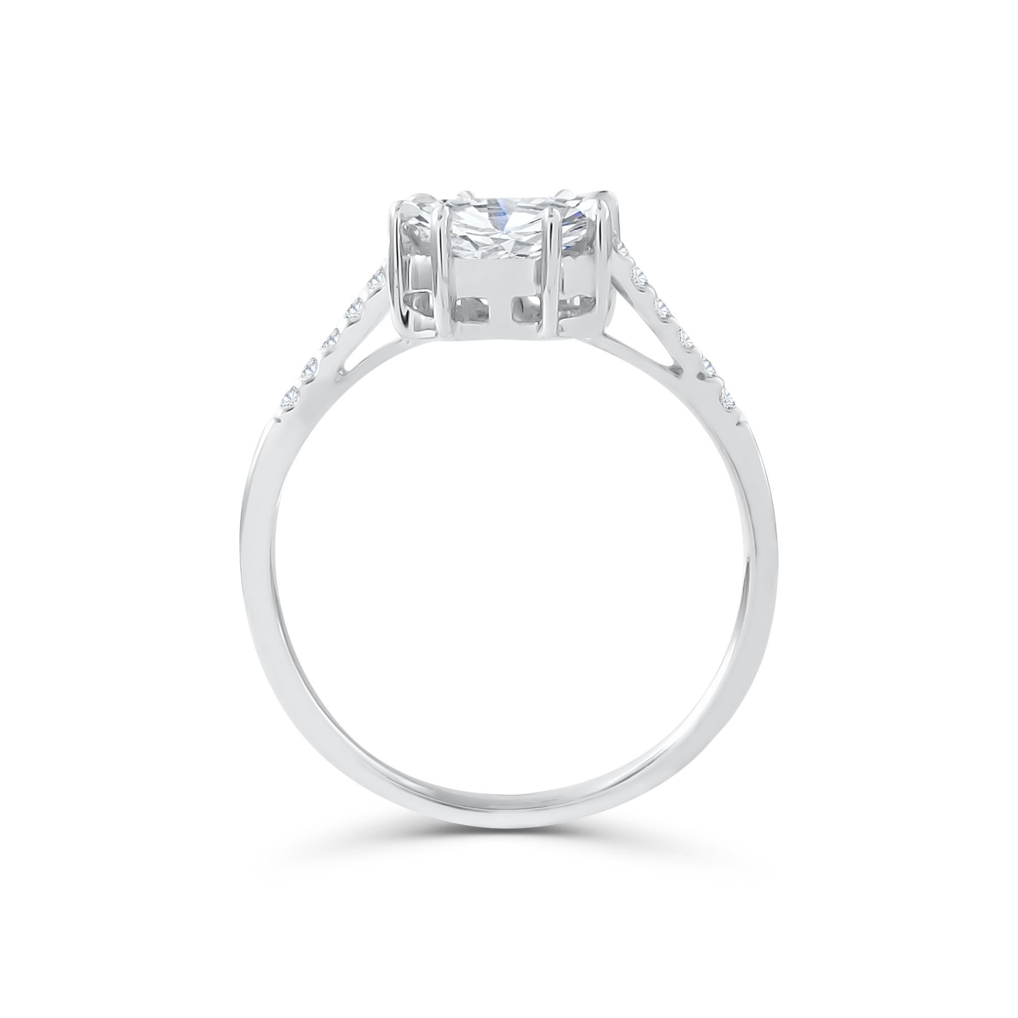 This diamond ring has an Emerald shape Illusion (Pie Cut Diamonds) to create the look of a 3.00 carat single Emerald-cut stone, Handcrafted in 18 karat white gold. This Ring will add a touch of sophistication to both daytime and evening looks.

Our