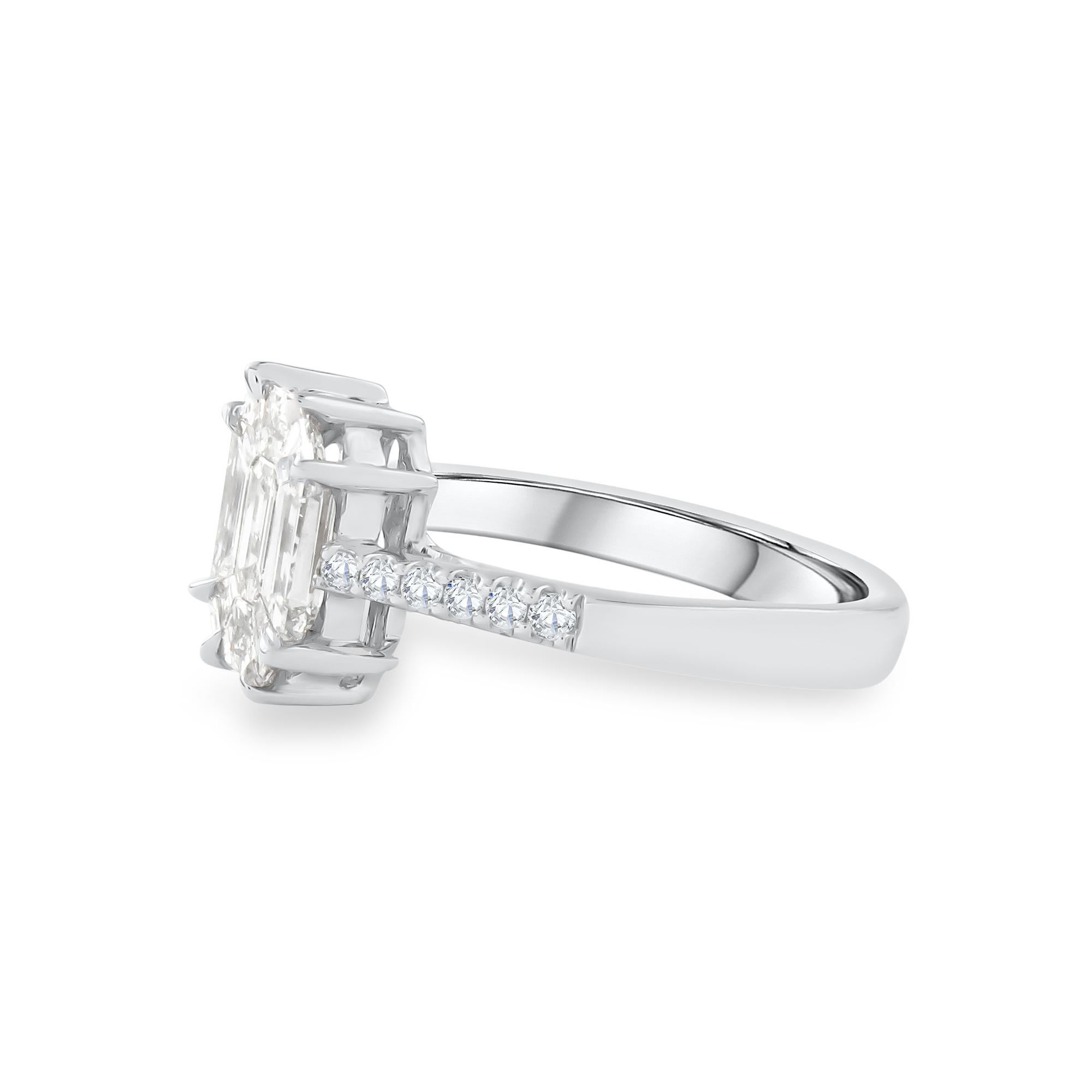 Art Deco 18 Karat White Gold Emerald Cut Diamond Engagement Ring For Sale