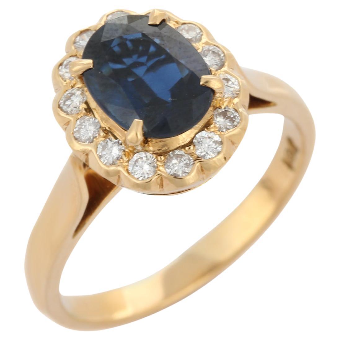 For Sale:  Vivacious 2.2 Ct Blue Sapphire and Diamond Halo Wedding Ring in 18K Yellow Gold