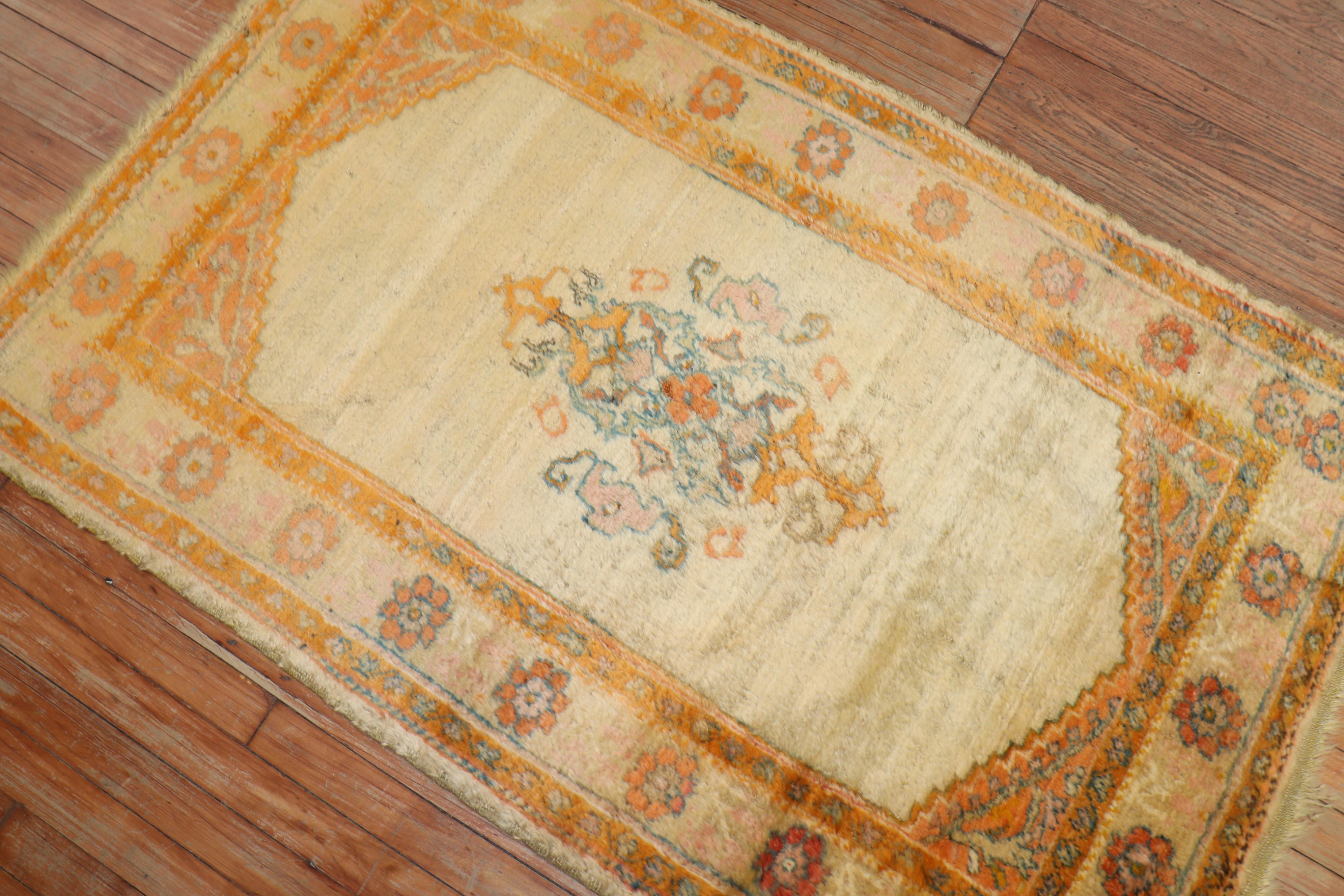 Early 20th century authentic ivory field Angora Oushak rug 

Measures: 3'2'' x 5'

Oushak rugs are prized for their rich looks as well as for their high quality and exceptional beauty, which makes them excellent decorative pieces. The ones made