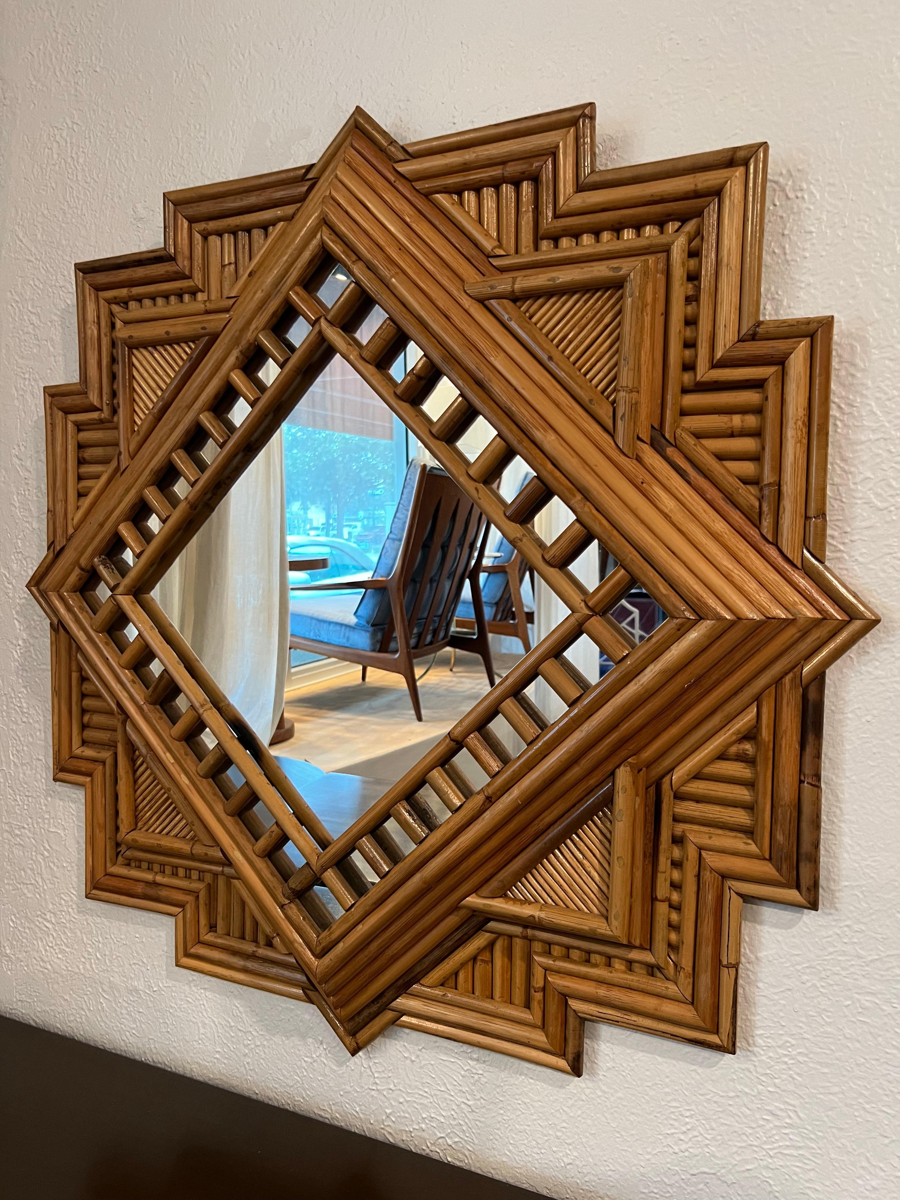 Vivai Del Sud attributed geometrical rattan mirror. 

Would work well in a variety of interiors such as modern, mid century modern, Hollywood regency, etc. Piece blends seamlessly with other designers such as Warren Platner, Paul Evans, Gabriella