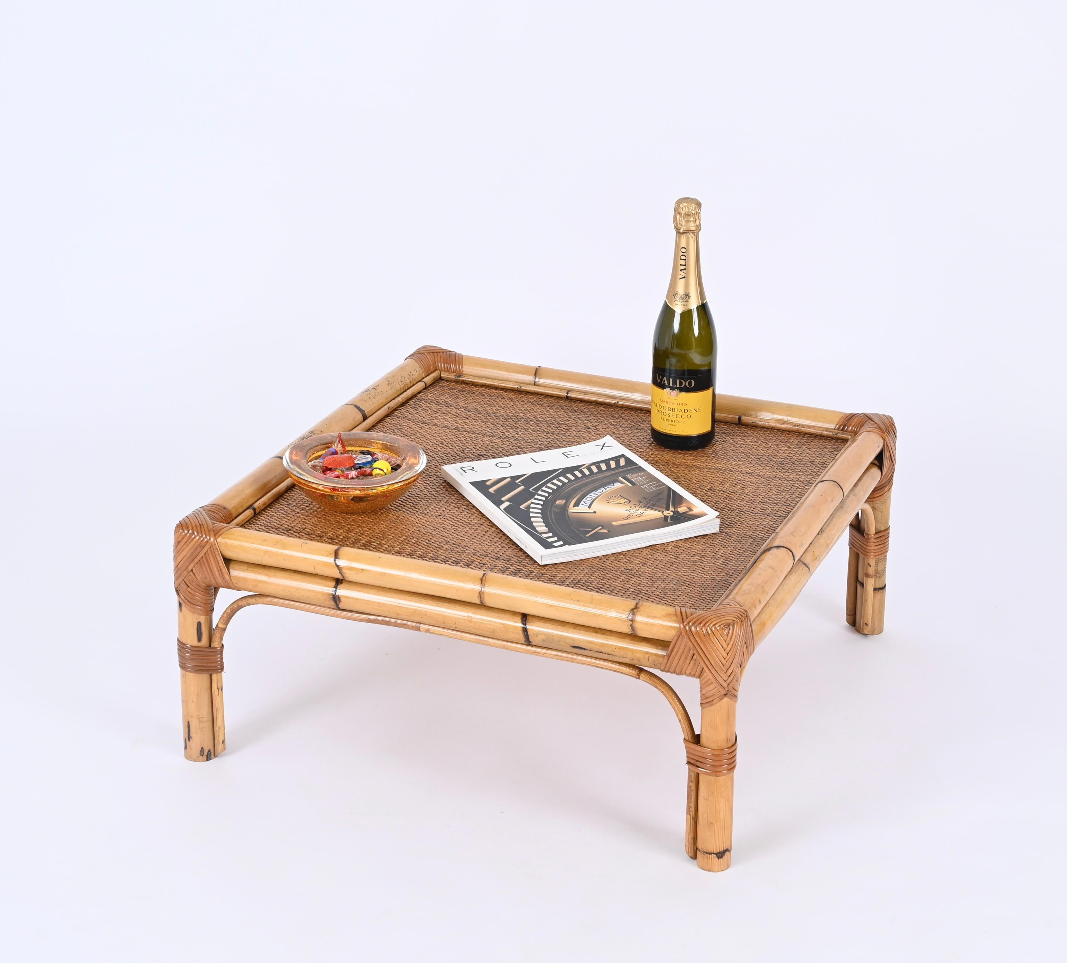 Fantastic French Riviera style square coffee table in bamboo, rattan and wicker. This lovely coffee table was produced by Vivai del Sud in Italy in the 1970s. 

Handcrafted with perfect proportions, this table features a structure in solid bamboo