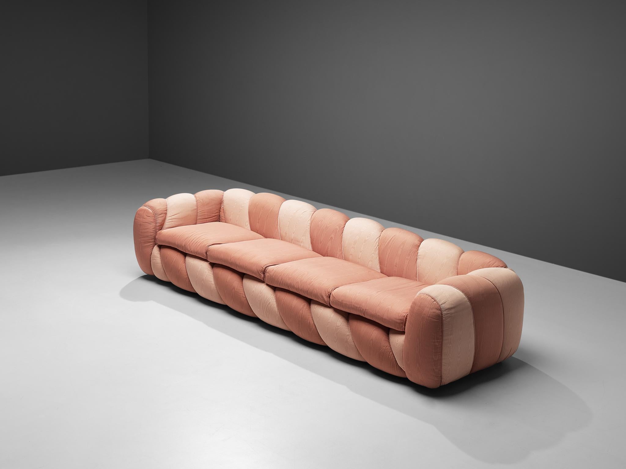 Vivai del Sud, sofa, pink fabric upholstery, Italy, 1970s 

This vibrant and cheerful sofa was created in the 1970s. This item is upholstered in a shiny two-tone pink fabric. The smooth and bulky form, combined with the sweet color, creates an