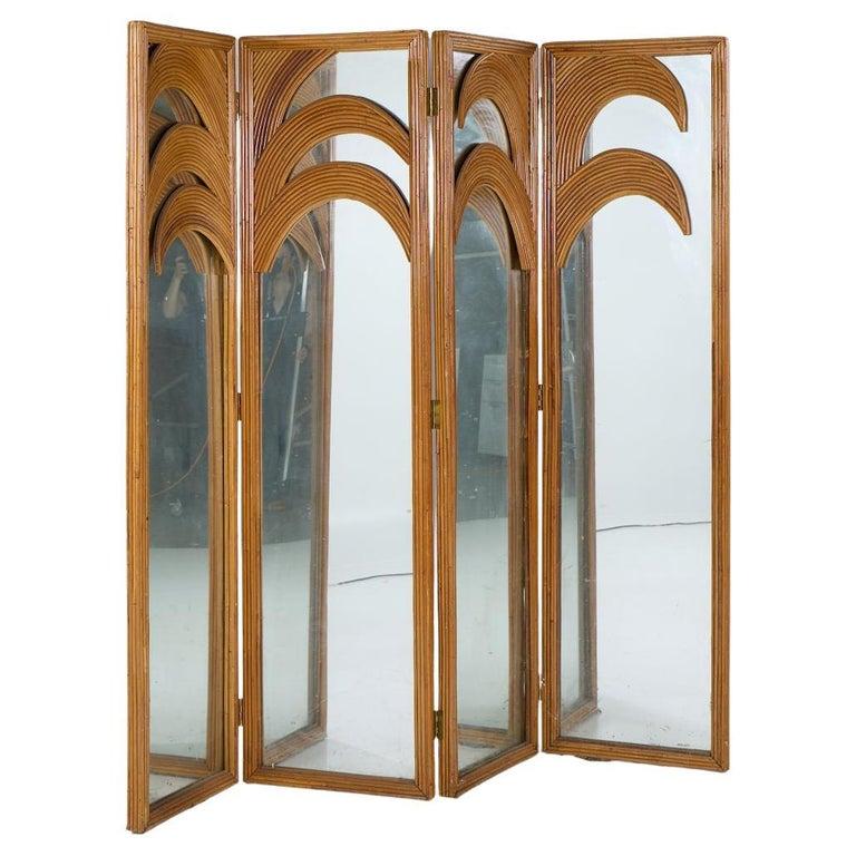 Vivai del Sud Mid Century Italian Bamboo Rattan Palm Tree Folding Screen Mirror

This folding screen measures: 87 wide x 1.75 deep x 80.75 inches high (each panel measures 21.75 inches wide)

We take our photos in a controlled lighting studio to
