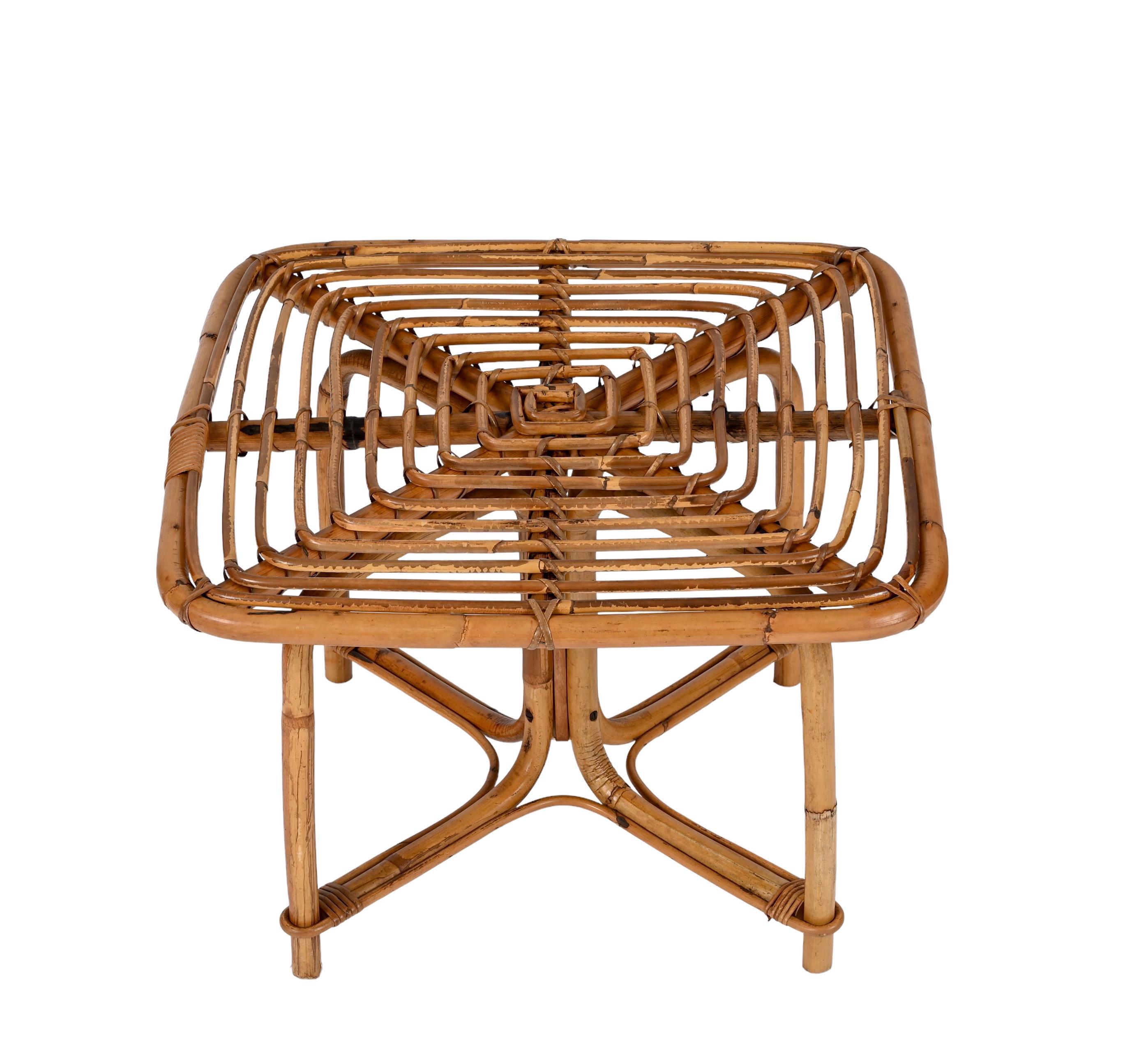 Unique mid century Italian bamboo and rattan squared coffee table. Vivai del Sud designed this wonderful item in Italy during the 1970s.
The top of the table is incredible for how the bamboo is curved creating a square spiral shape. The stunning