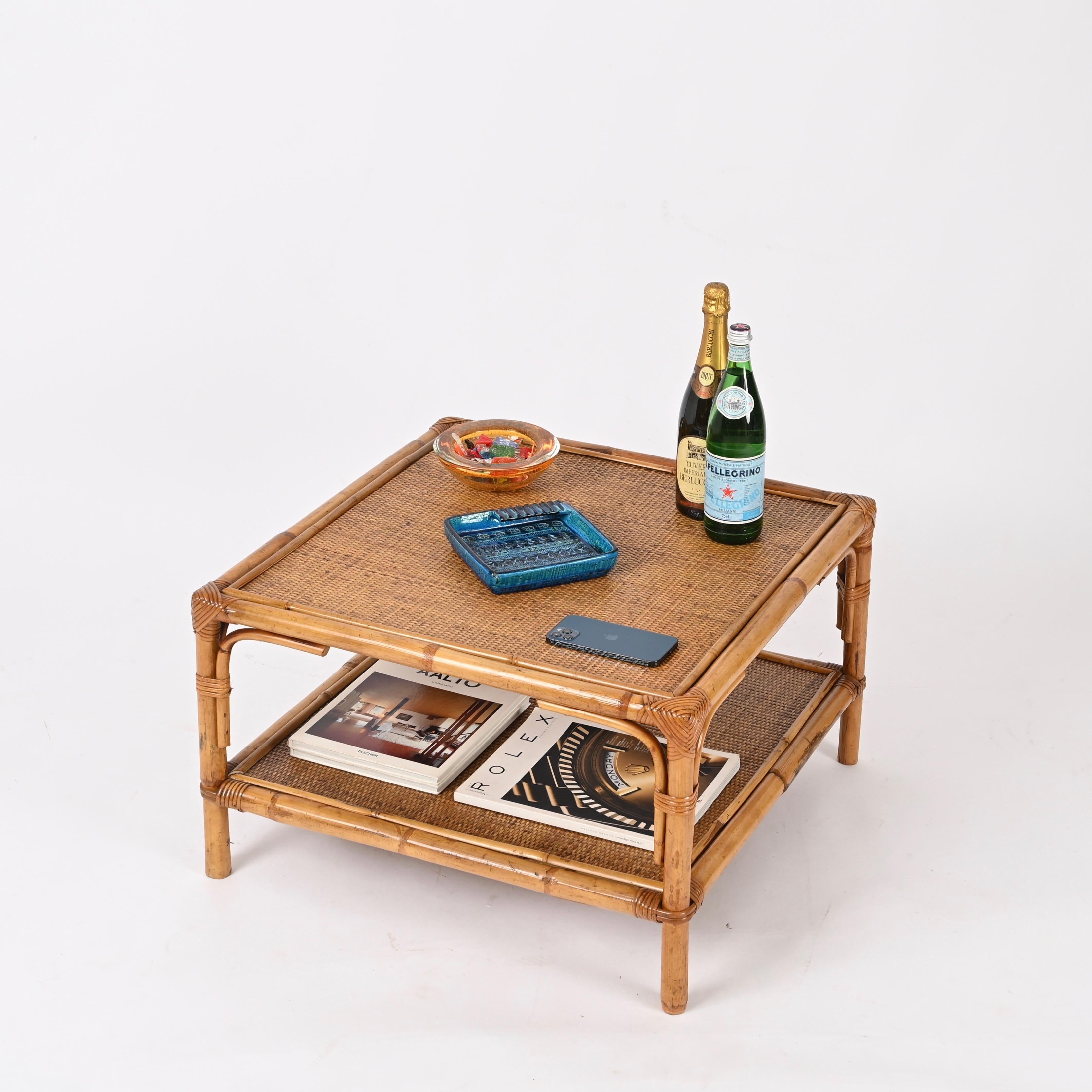 Gorgeous Mid-Century two-tier square coffee table fully made in bamboo, rattan and wicker. This lovely organic cocktail table was designed by Vivai del Sud in Italy in the 1970s.

This table was fully hand-crafted with perfect proportions, it