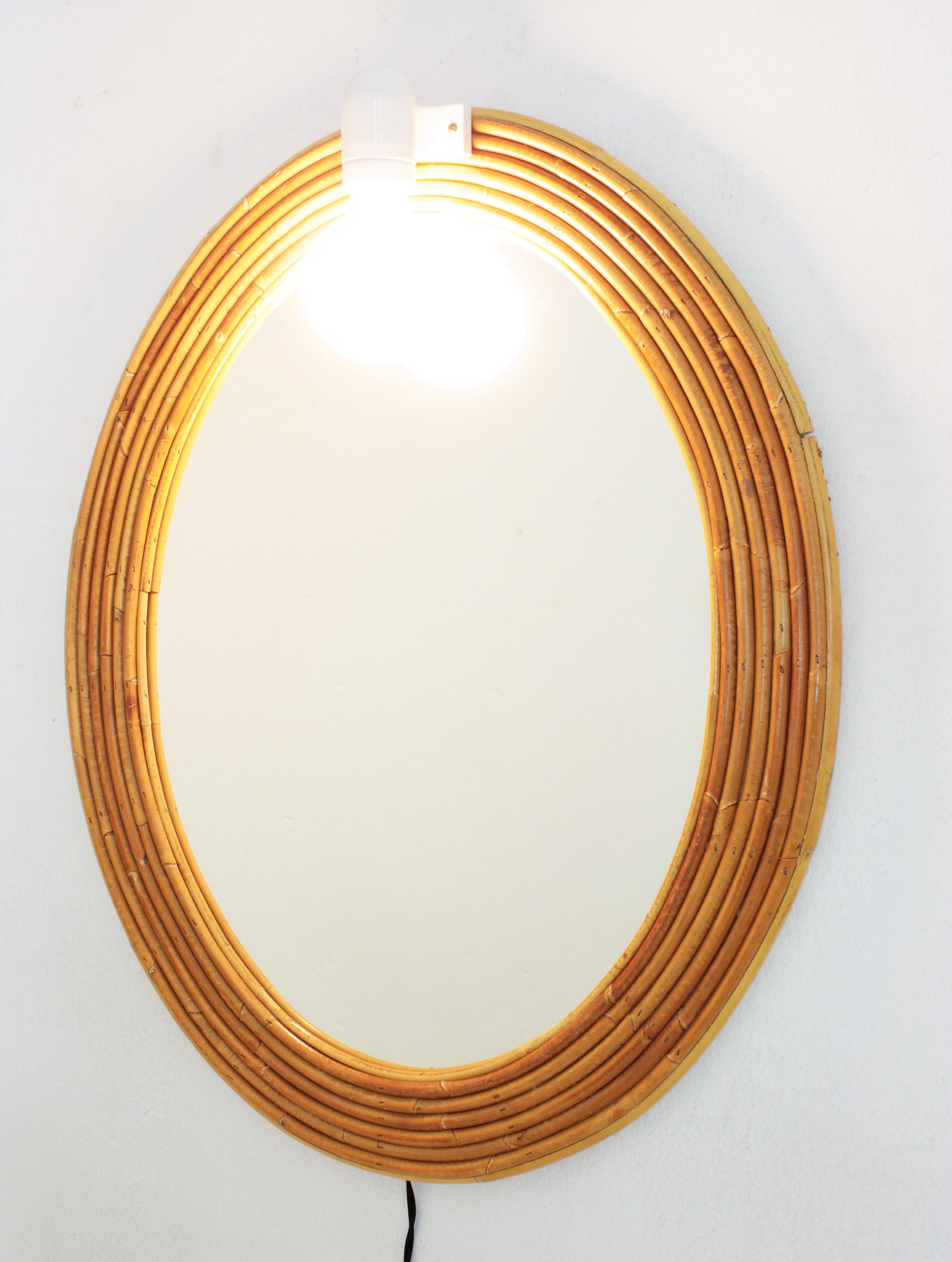 Vivai del Sud Rattan Oval Mirror with Wall Light For Sale 2