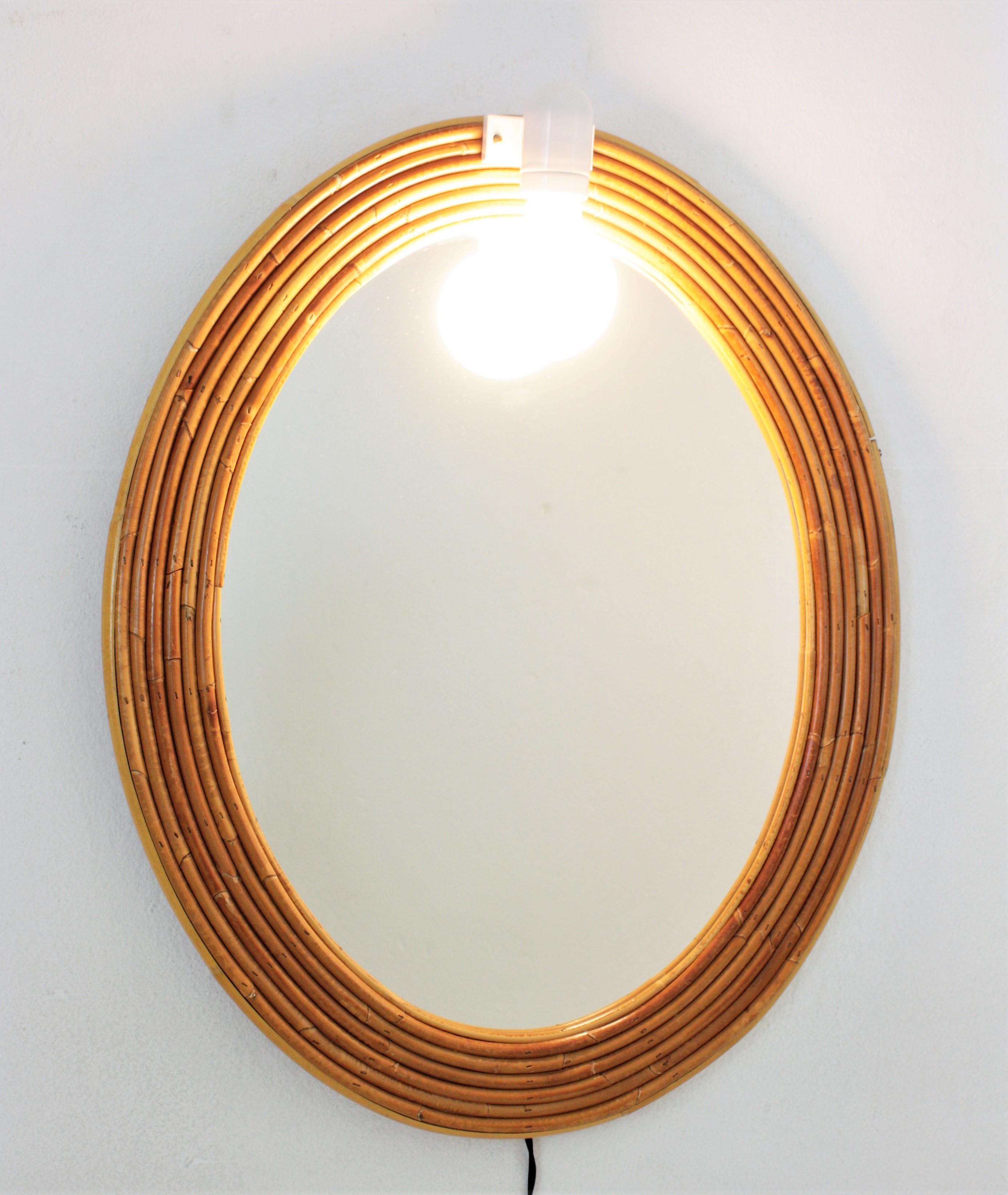 Vivai del Sud Rattan Oval Mirror with Wall Light For Sale 4