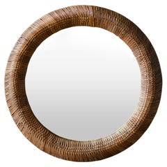 Vivai del Sud Round mirror in dark wicker, Italy 1950s.