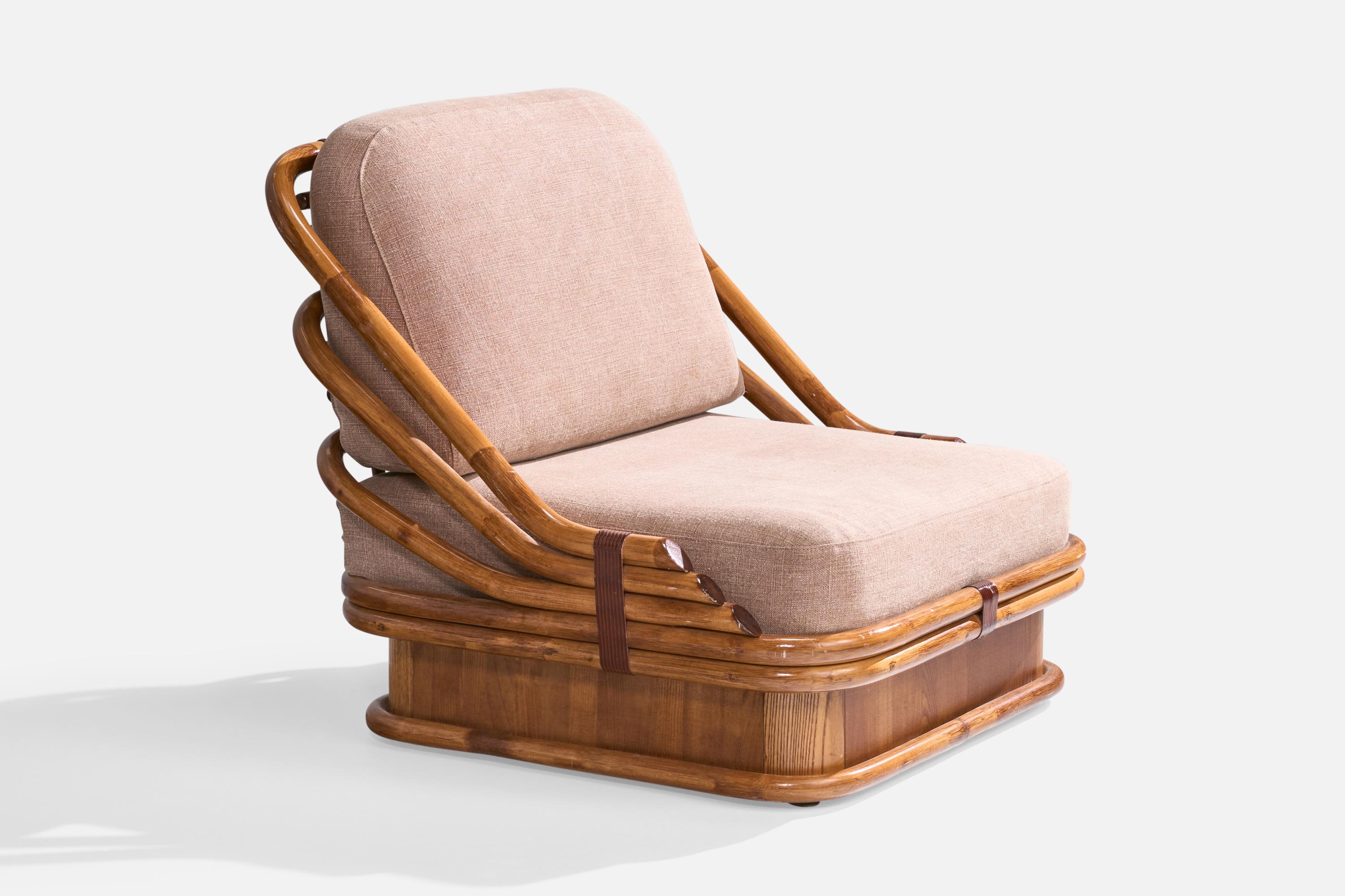 A bamboo, rattan and pink fabric slipper lounge chair produced by Vivai Del Sud, Italy, c. 1970s.

Reupholstered in brand new fabric.

Dimensions: 33.5” H x 34.25” W x 36” D

Seat Height: 15.5”

All upholstered furniture can be reupholstered upon