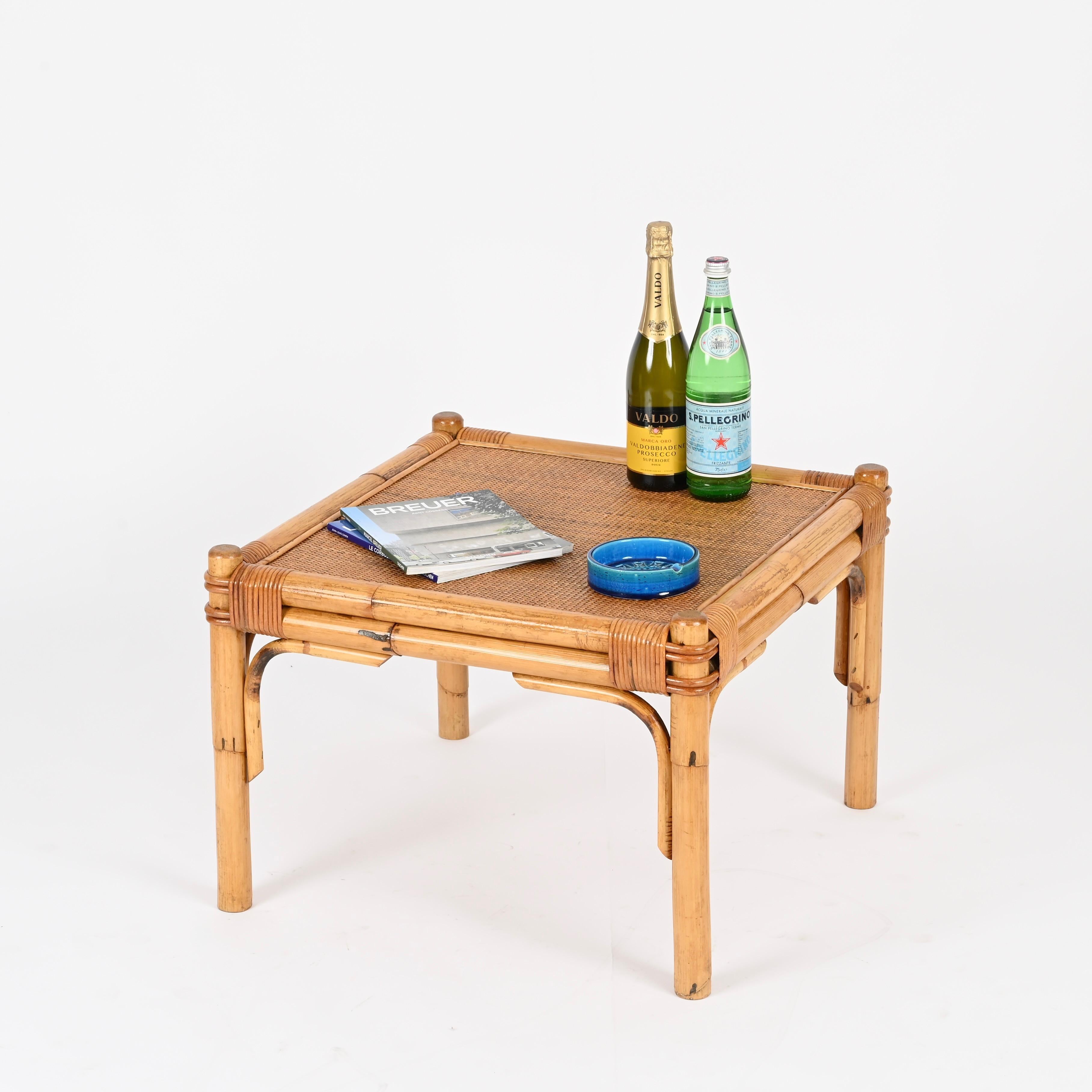 Gorgeous Mid-Century square coffee table in bamboo, rattan, and hand-woven wicker. This wonderful organic table was produced in Italy during the 1970s by Vivai del Sud.

In fabulous condition and with a charming honey-like color, it is fully