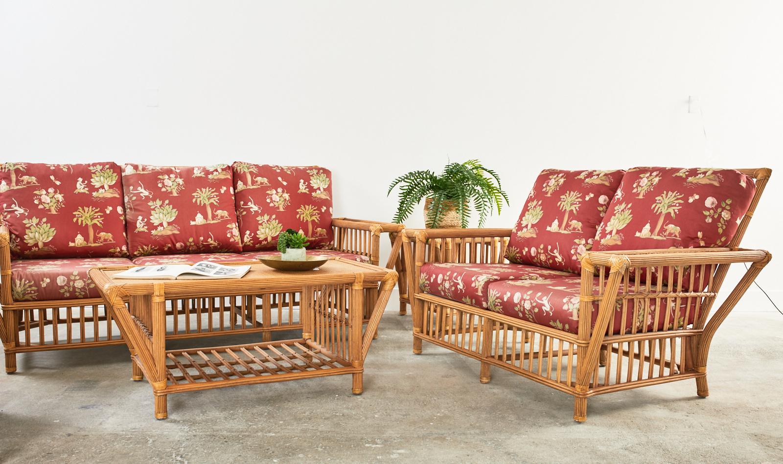 Extraordinary five piece living room or patio and garden suite crafted from rattan in the manner and style of Vivai del Sud. The set consists of a large sofa measuring 85