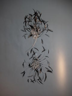 Vivian Alarcon - Feather and Glass Installation Artwork “Suspended Whispers” by Vivian Alarcón Feather and Glass Installation Artwork “Suspended Whispers” by Vivian Alarcón