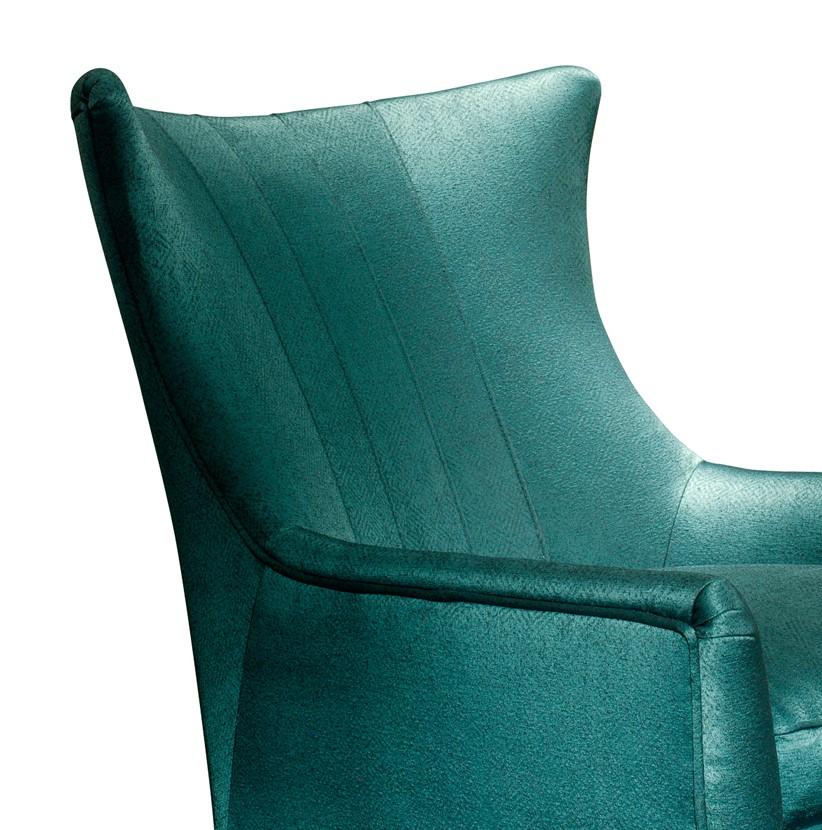 The design of this stunning armchair strikes a perfect balance between traditional style and modern allure, creating a superb addition to any refined interior. Placed in a reading nook, study, or living room, this will be a comfortable and