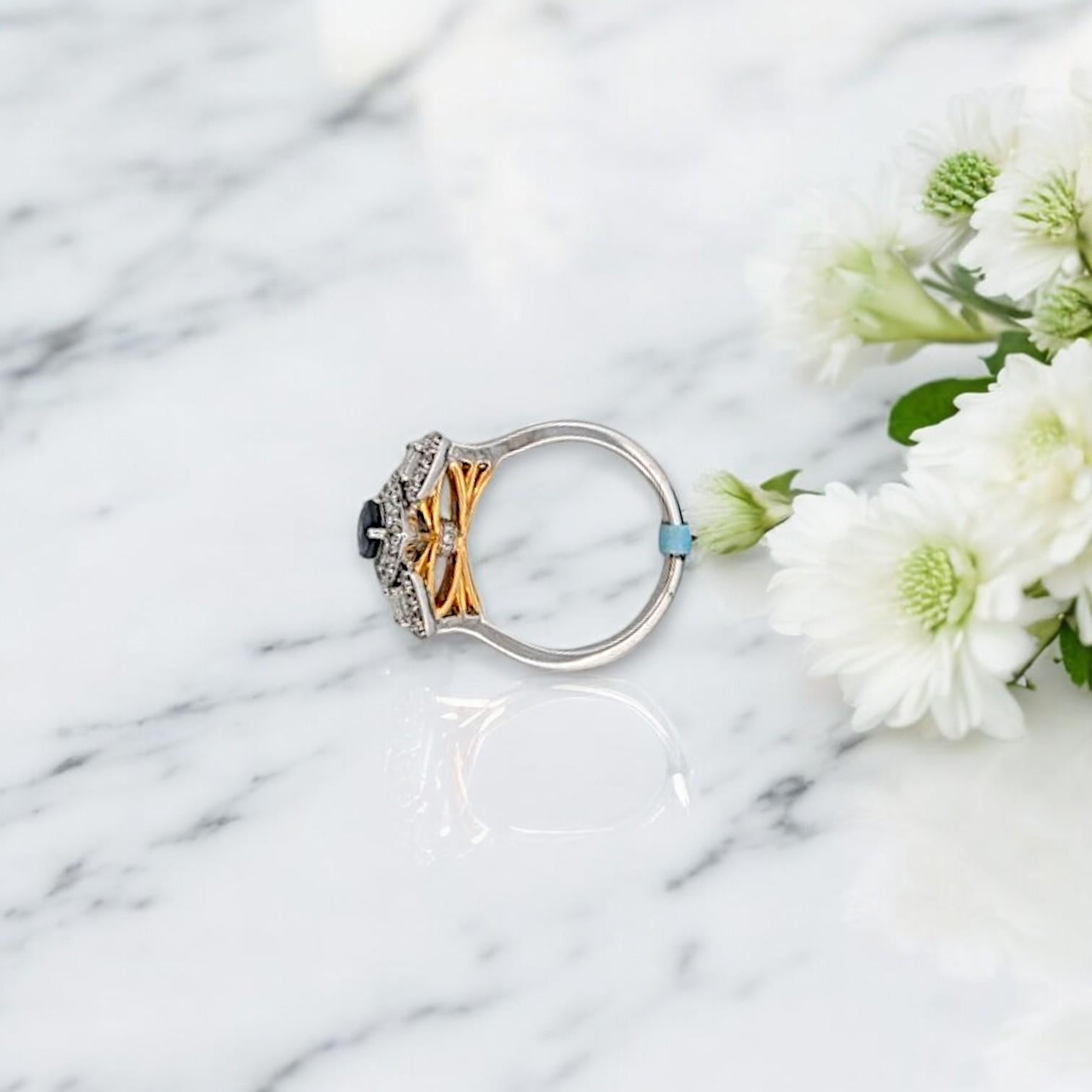 Modern Vivian  Elegant 18k White Gold Ring with Sapphire Center Stone and Diamond Halo