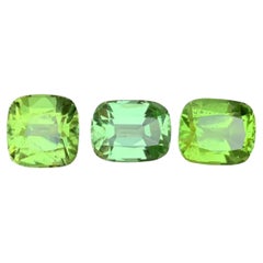 Peridoto verde chiaro e vivido 10,44 carati, taglio a cuscino, gemme naturali sciolte, pacco