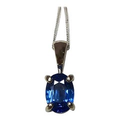 Vivid Blue 1 Carat Ceylon Sapphire Oval Cut 18 Karat Gold Solitaire Pendant