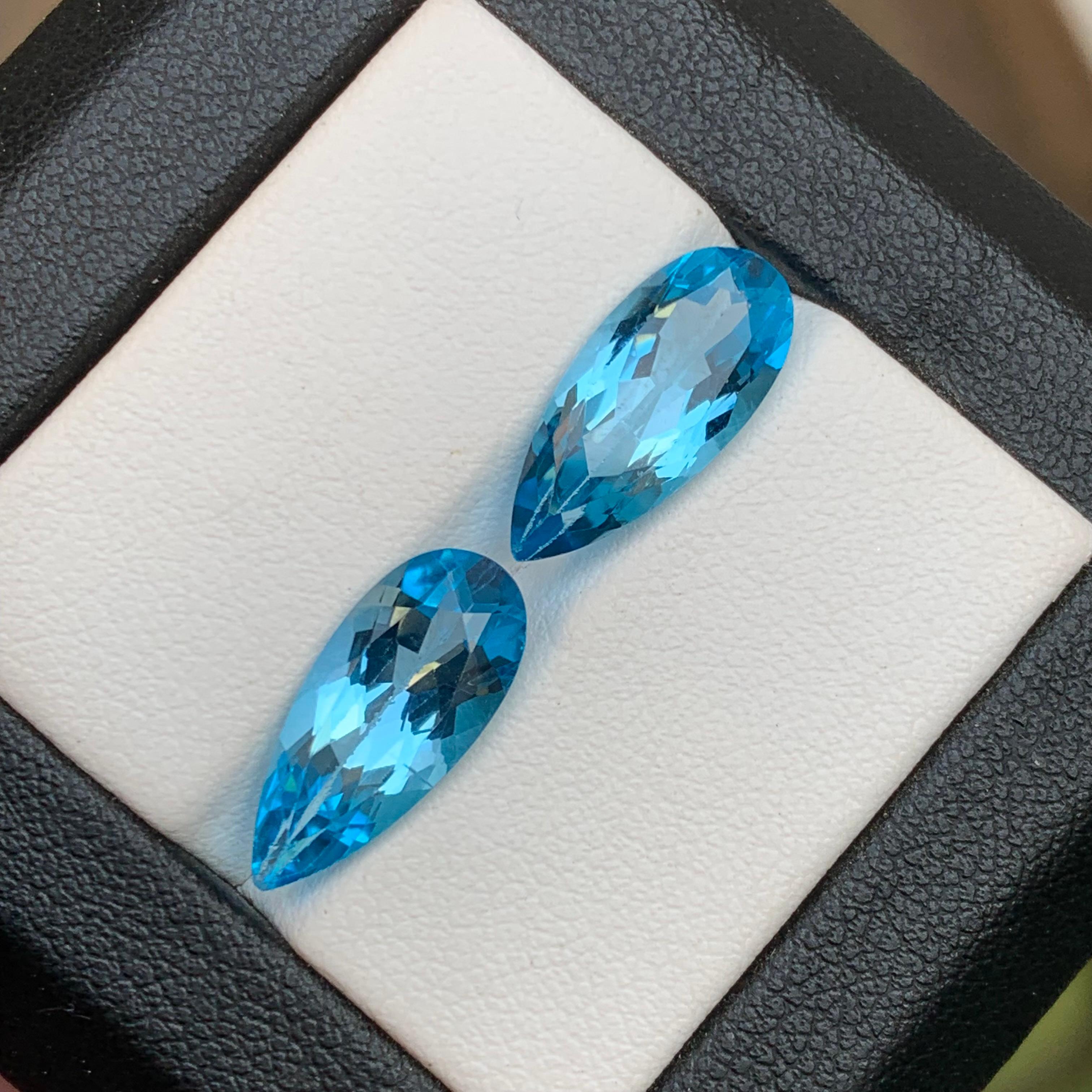 Women's or Men's Vivid Blue Natural Swiss Topaz Loose Gemstone Pair for Earrings 8.90 Ct Pear Cut For Sale