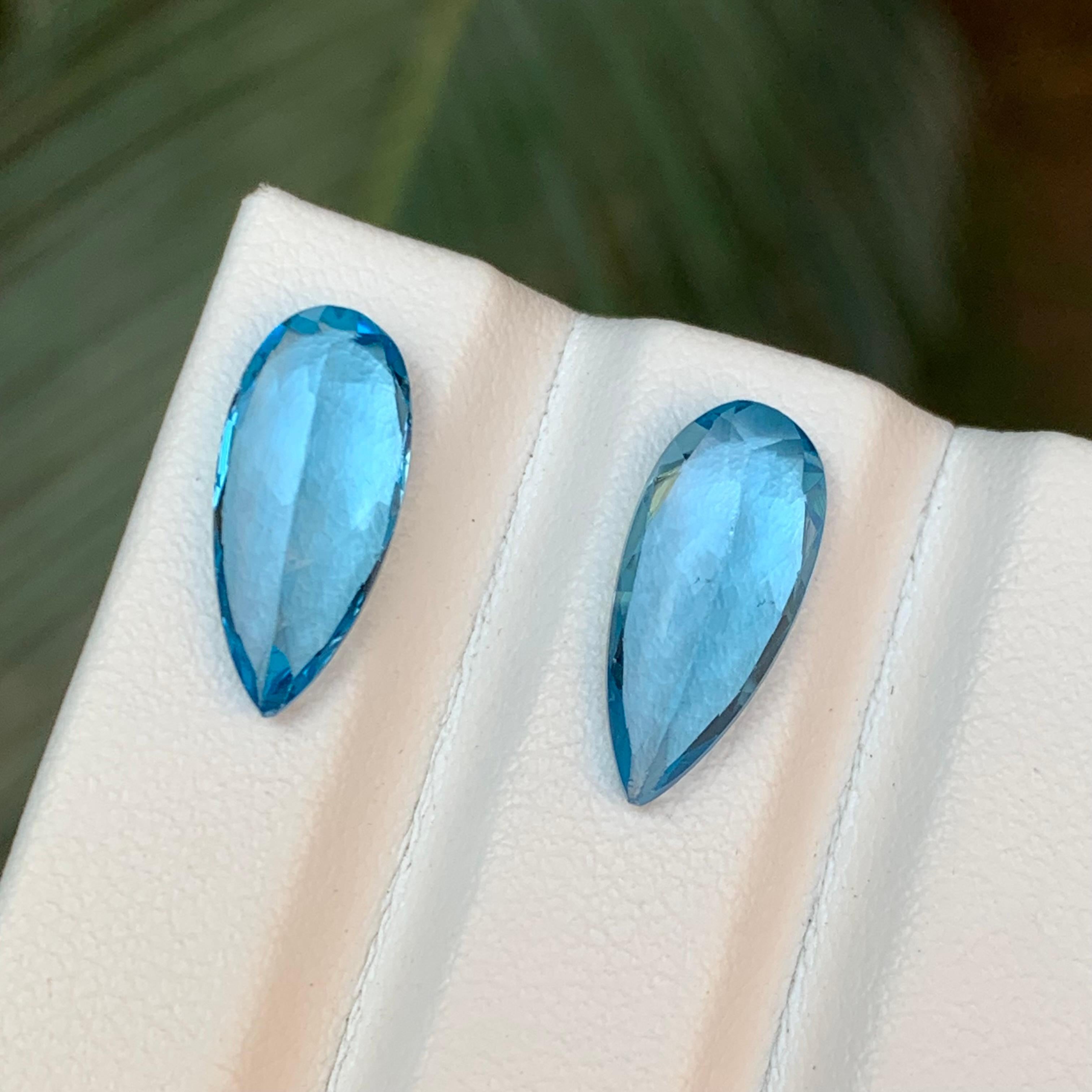 Vivid Blue Natural Swiss Topaz Loose Gemstone Pair for Earrings 8.90 Ct Pear Cut For Sale 3