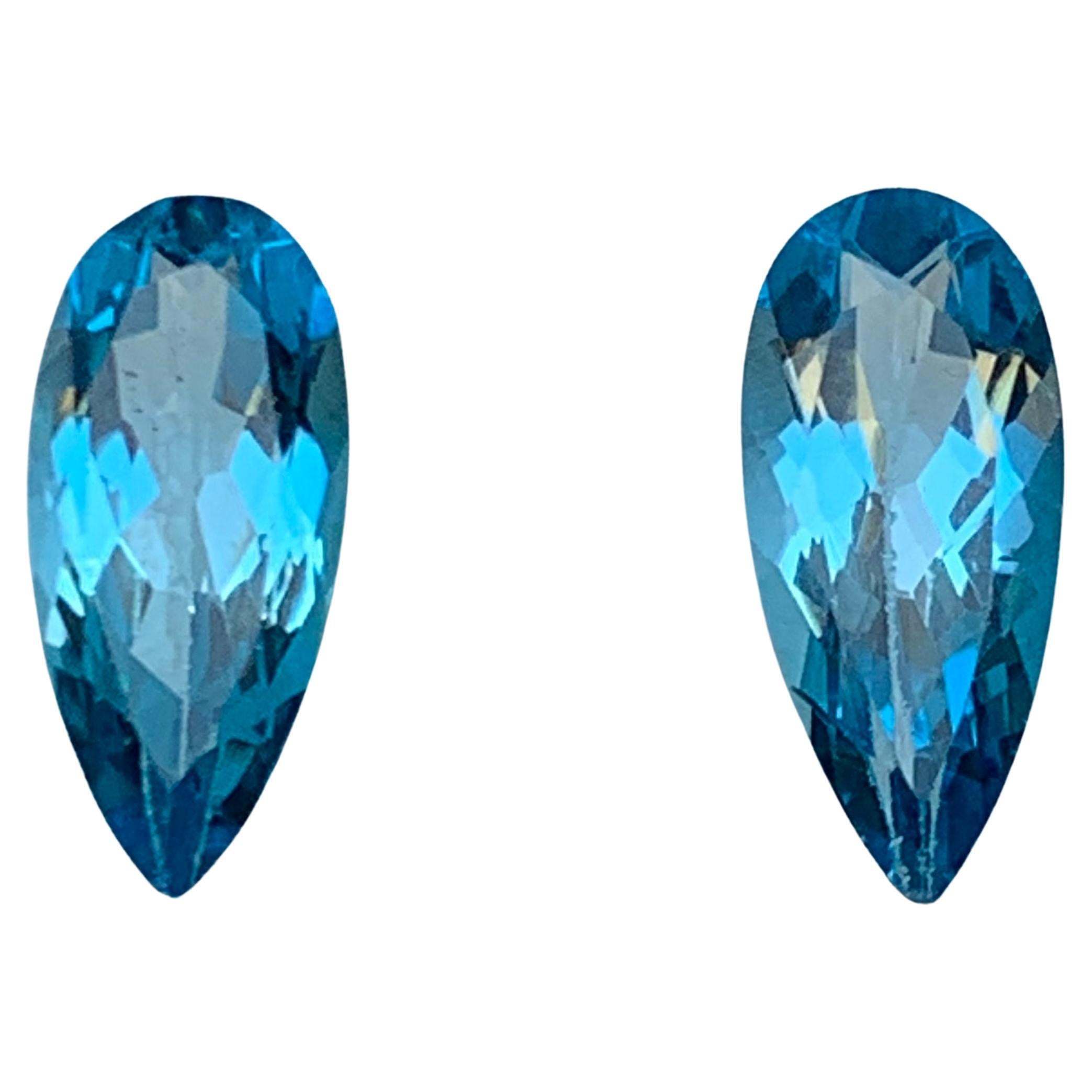 Vivid Blue Natural Swiss Topaz Loose Gemstone Pair for Earrings 8.90 Ct Pear Cut For Sale