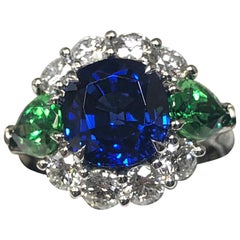 Vivid Blue Sapphire 4.45 Carat with AGL Cert. Tsavorite & Diamond Cocktail Ring