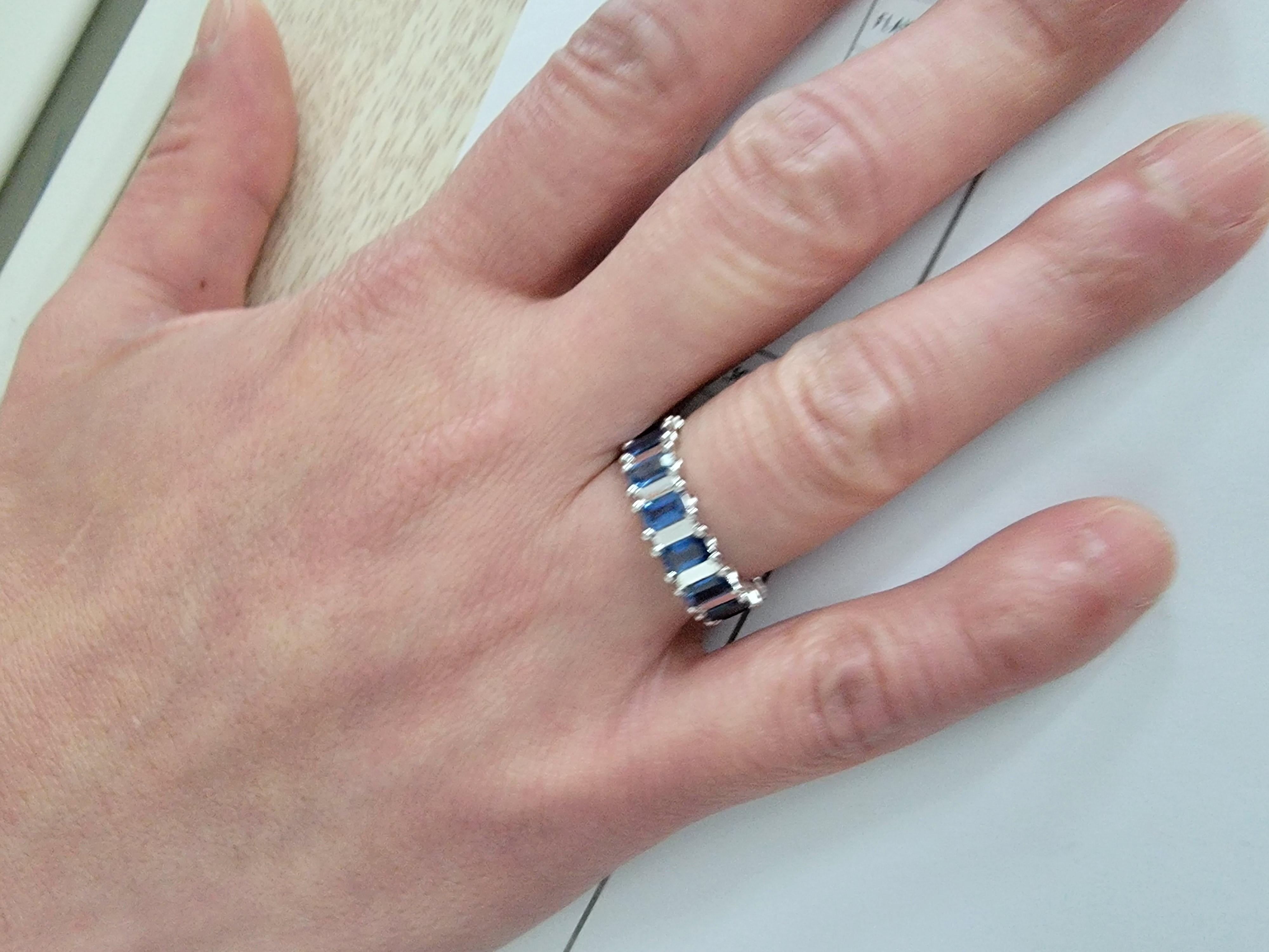 For Sale:  Vivid Blue Sapphire and 18K White Gold Infinity Band Ring with engraving 14
