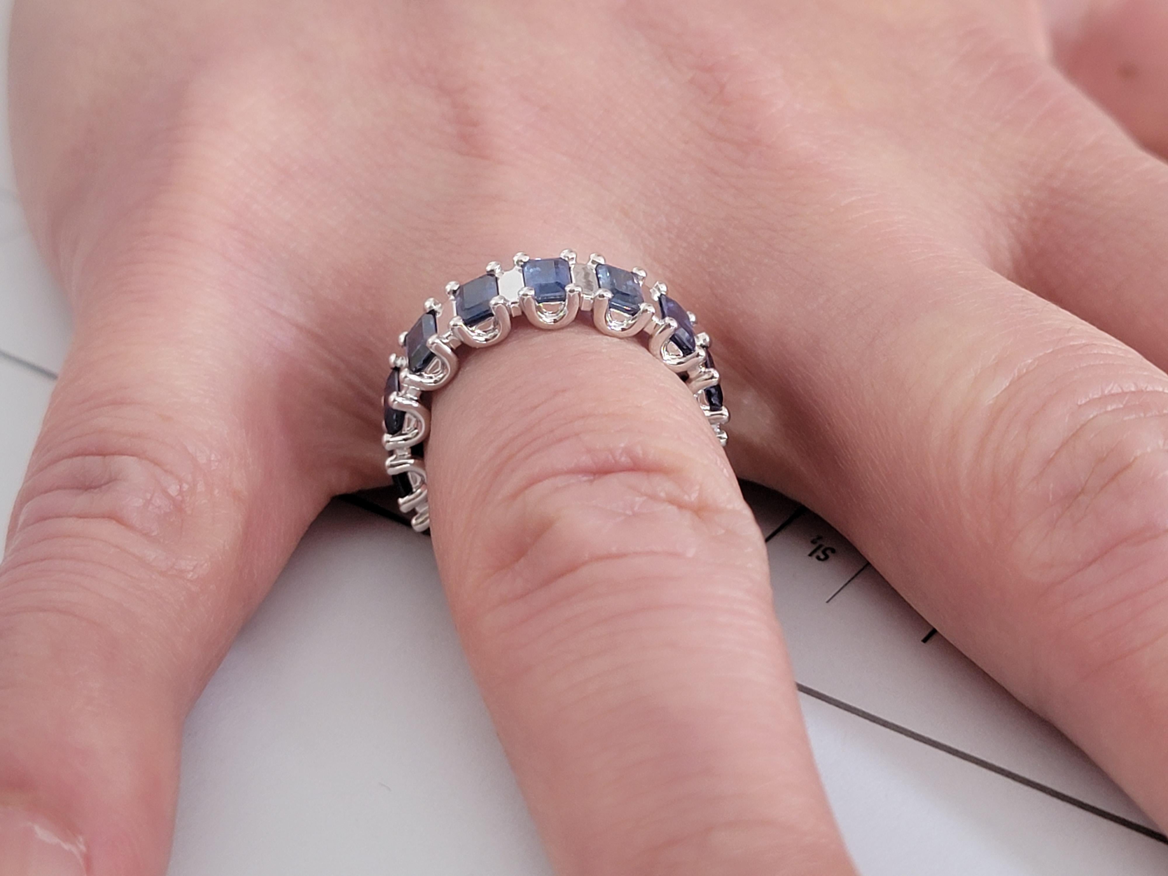 For Sale:  Vivid Blue Sapphire and 18K White Gold Infinity Band Ring with engraving 7