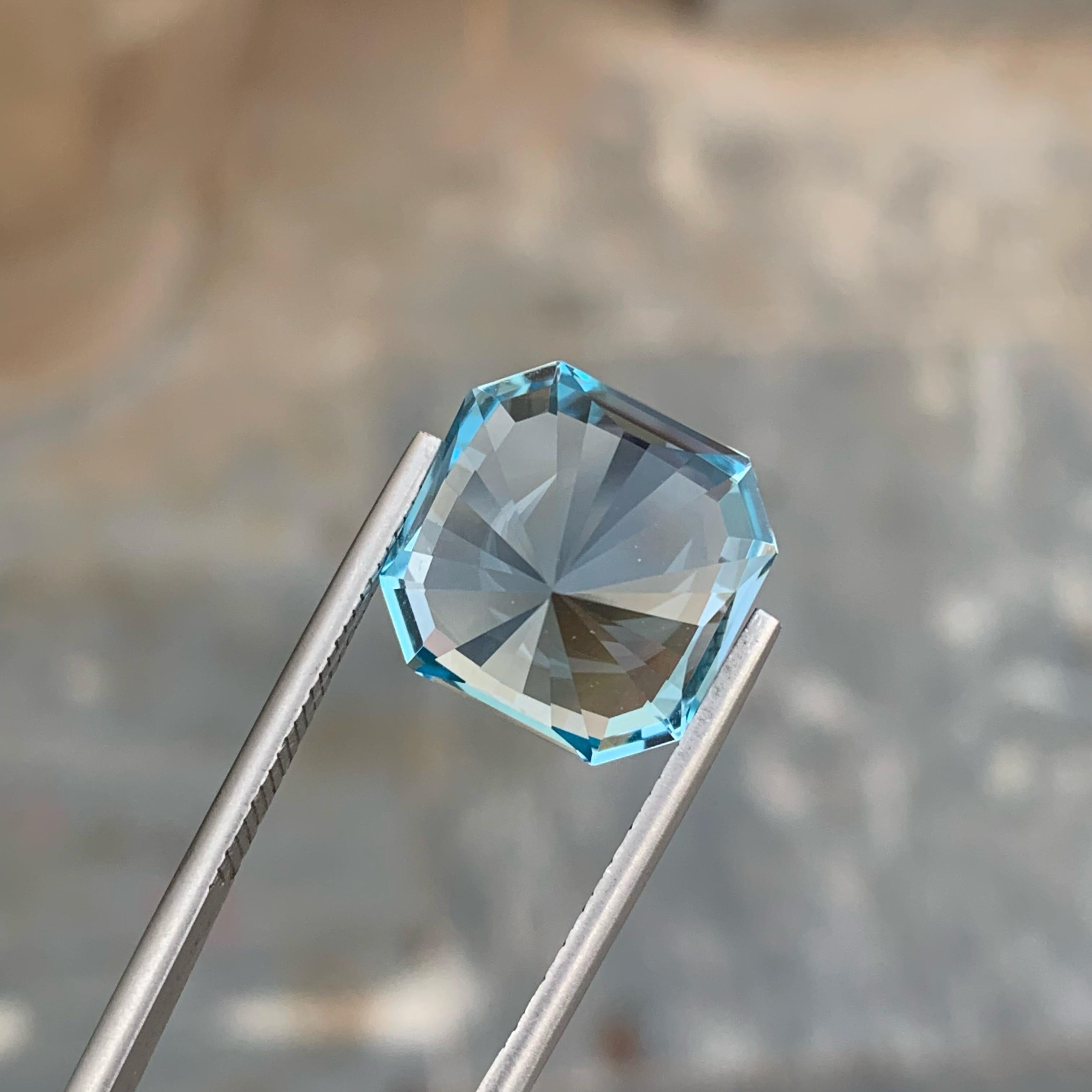Weight 15.65 carats 
Dimensions 14.2 x 14.2 x 9.7 mm
Treatment Heated 
Clarity VVS (Very, Very Slightly Included)
Origin Madagascar
Shape Octagon 
Cut Asscher 




Elevate your jewelry collection with this exquisite Vivid Blue Topaz gemstone,