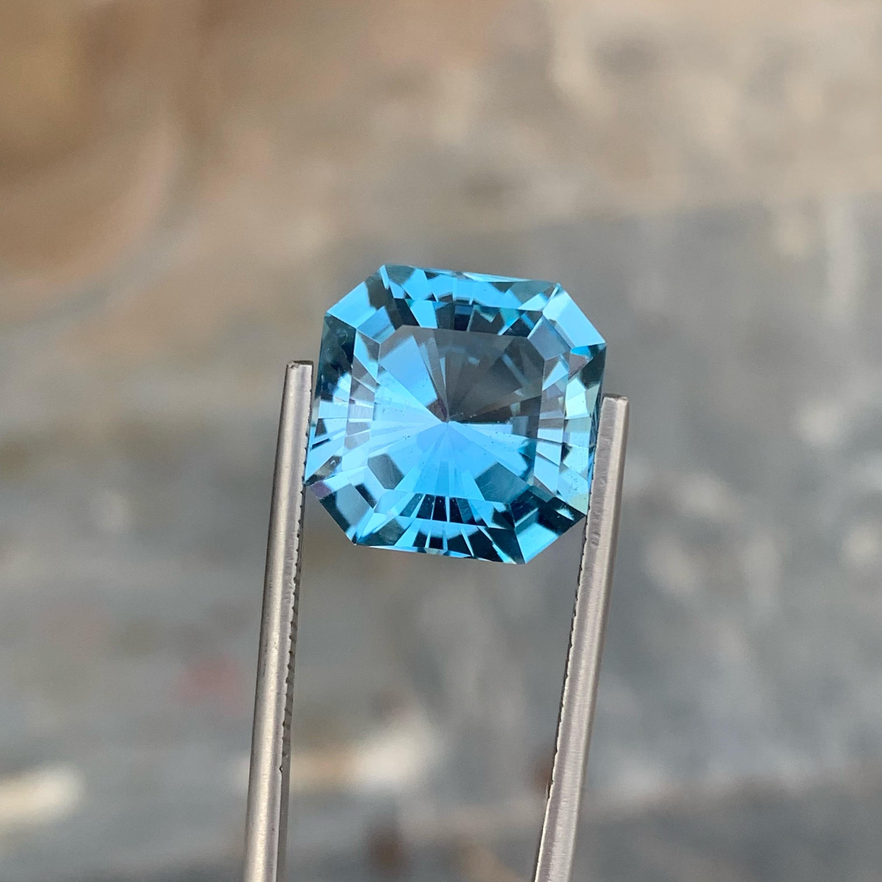 Modern Vivid Blue Topaz 15.65 carats Asscher Cut Natural Loose Madagascar's Gemstone For Sale