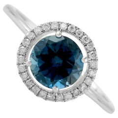 Vivid Blue Topaz Ring With Diamonds Made In 18Kt White Gold