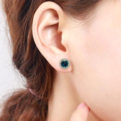Pendientes de oro amarillo de 18 quilates con diamantes y topacio azul intenso