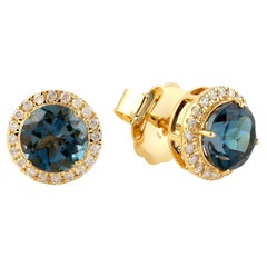 Vivid Blue Topaz Ohrstecker mit Diamanten aus 18Kt Gelbgold