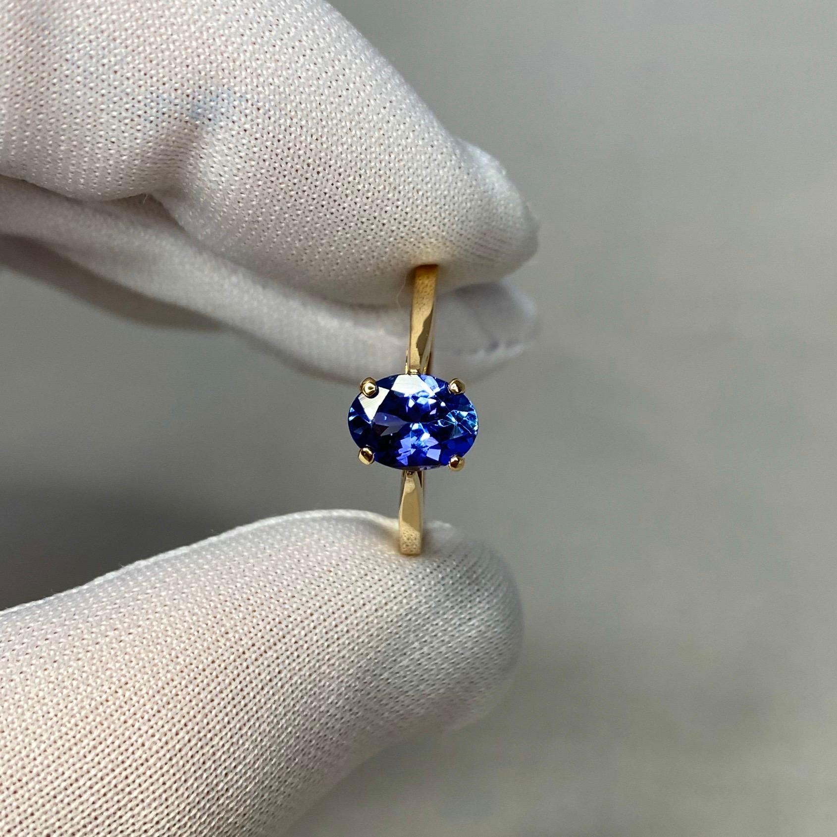 Fine natural vivid blue violet tanzanite set in a beautiful 14k yellow gold solitaire ring.

1.34 carat stone with stunning vivid blue violet colour and very good clarity. A very clean stone with only some small natural inclusions visible when