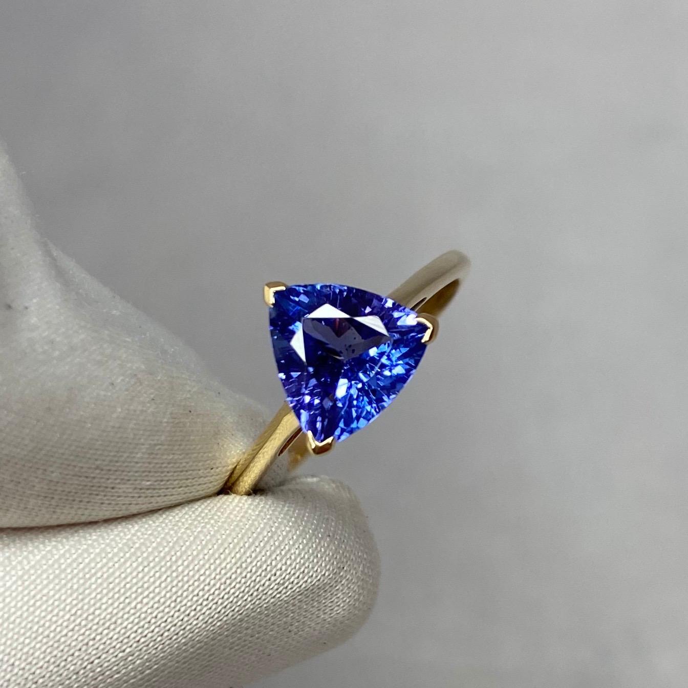 Vivid Blue Violet Tanzanite Yellow Gold Solitaire Ring

1.70 Carat tanzanite with a stunning vivid violet blue colour and very good clarity. A very clean stone with only some small natural inclusions visible when looking closely. Set in a fine 14k