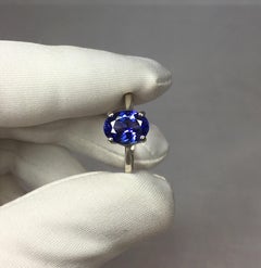 Vivid Blue Violet Tanzanite 1.77 Carat Oval Cut Solitaire 14 Karat Gold Ring