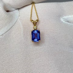 Vivid Blue Violet Tanzanite and Diamond Yellow Gold Pendant Necklace Emerald Cut