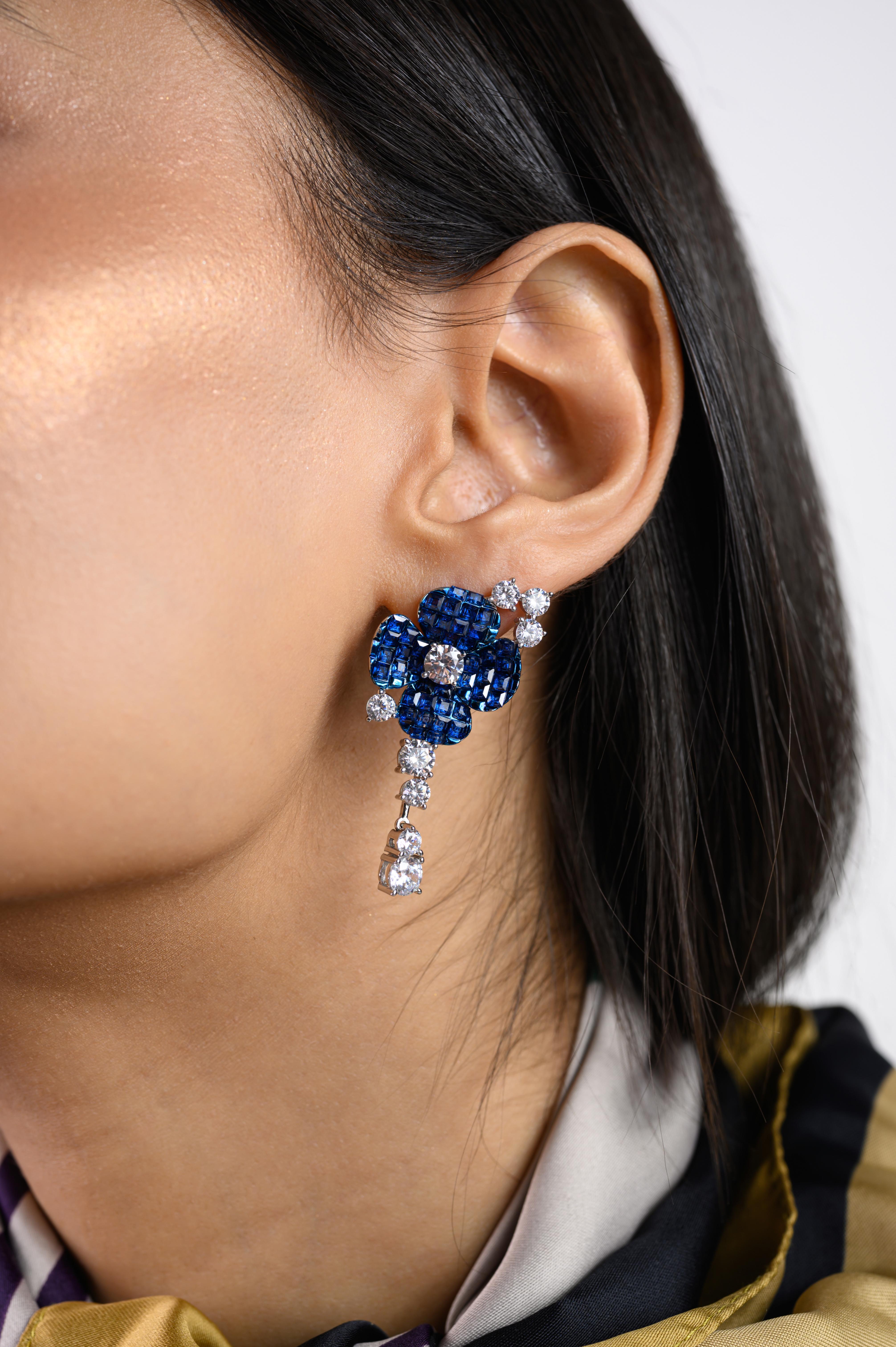 Vivid Bluecolor Rhinestone Flower Wedding Drop Earrings in sterling silver. You shall need these statement drop earrings to make a statement with your look. Each piece features dazzling cubic zirconia stones, renowned for their brilliance and