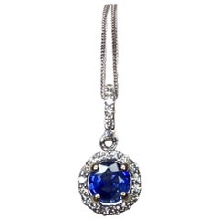 Vivid Ceylon Blue Sapphire and Diamond 18 Karat Gold Round Pendant Necklace
